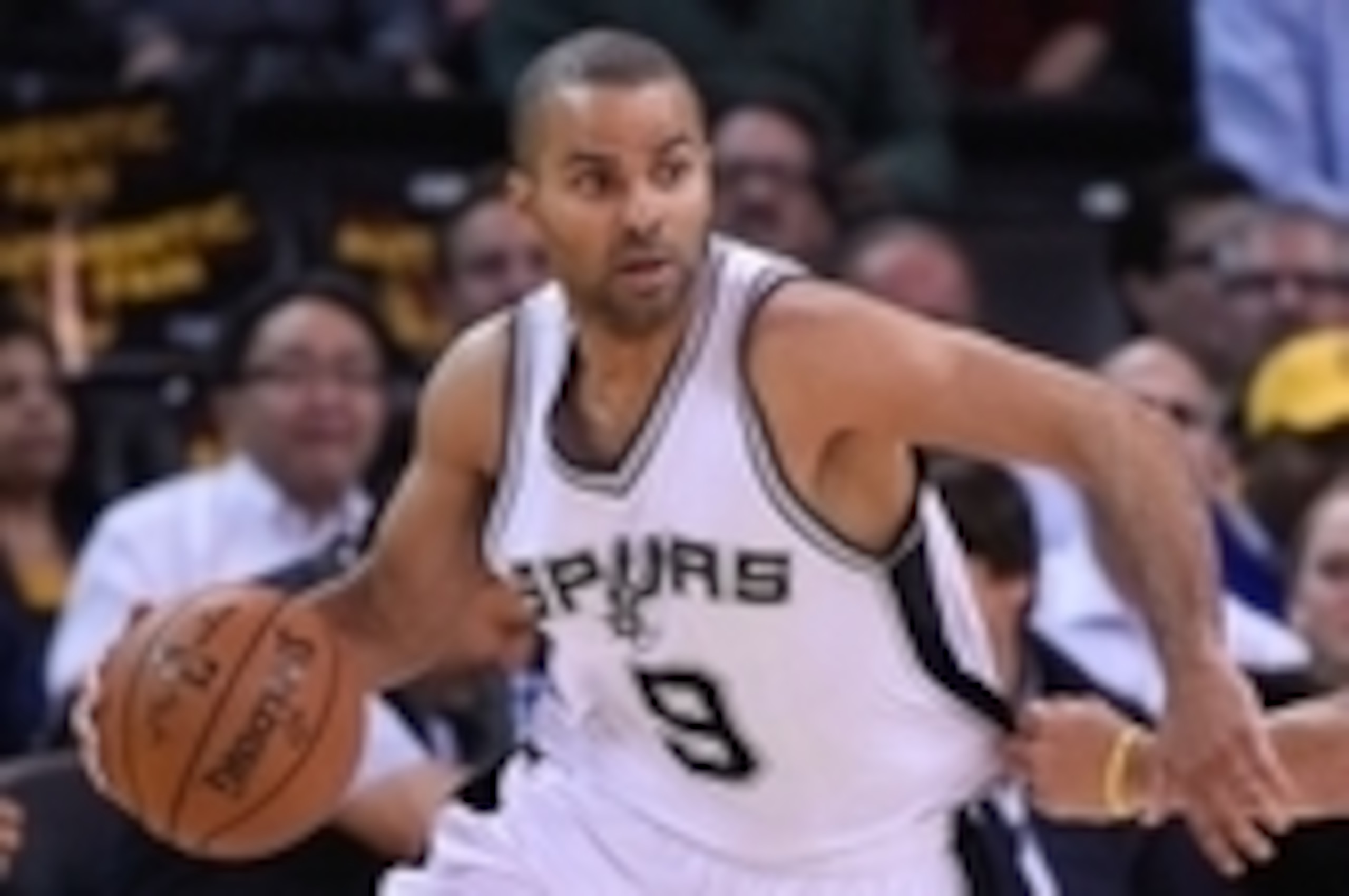 February 20, 2015; Oakland, CA, USA; San Antonio Spurs guard Tony Parker (9) dribbles the basketball during the first quarter against the Golden State Warriors at Oracle Arena. The Warriors defeated the Spurs 110-99. Mandatory Credit: Kyle Terada-USA TODA