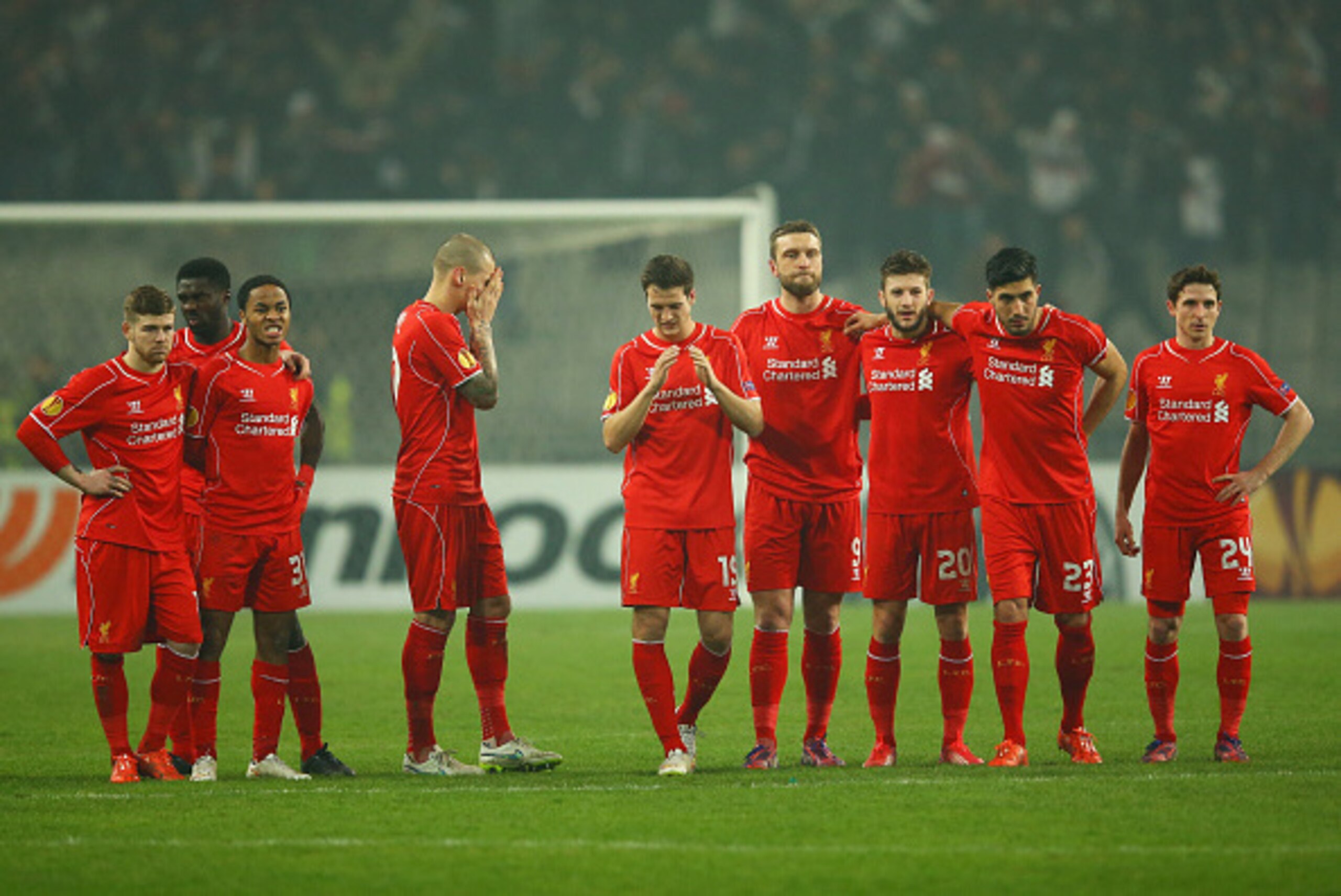 ISTANBUL, TURKEY - FEBRUARY 26: Liverpool players look dejected as Dejan Lovren of Liverpool misses the decisive kick in the penalty shoot out during the UEFA Europa League Round of 32 second leg match between Besiktas JK and Liverpool FC on February 26, ISTANBUL, TURKEY - FEBRUARY 26: Liverpool players look dejected as Dejan Lovren of Liverpool misses the decisive kick in the penalty shoot out during the UEFA Europa League Round of 32 second leg match between Besiktas JK and Liverpool FC on February 26,