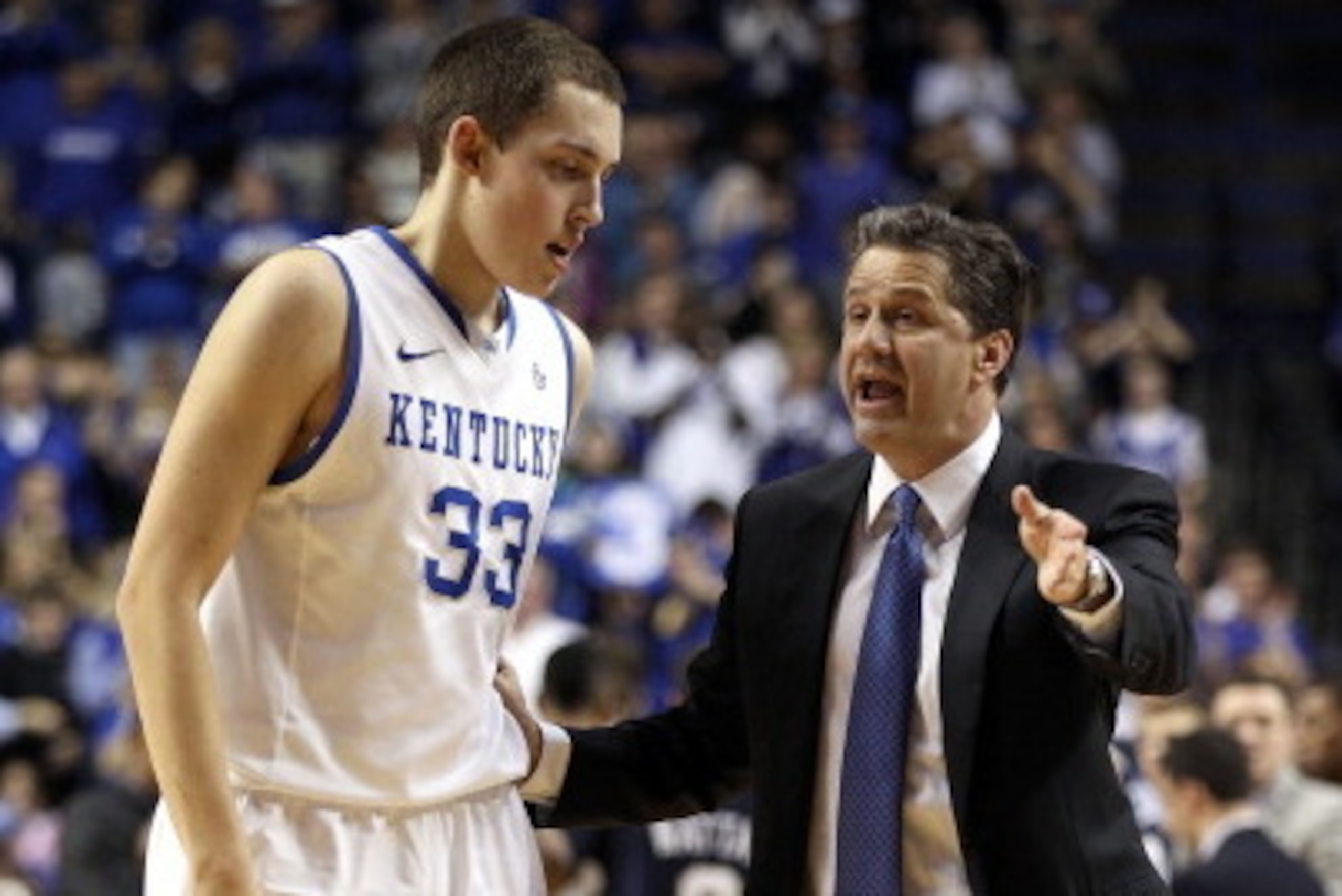 LEXINGTON, KY - DECEMBER 17:  John Calipari the head coach of the Kentucky Wildcats gives instructions to Kyle Wiltjer #33 during the game against the Chattanooga Mocs at Rupp Arena on December 17, 2011 in Lexington, Kentucky.  (Photo by Andy Lyons/Getty 