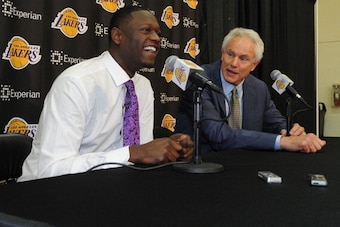 EL SEGUNDO, CA - JUNE 30:  Julius Randle #30 of the Los Angeles Lakers speaks to the media during his introductory press conference with Los Angeles Lakers General Manager Mitch Kupchak on June 30, 2014 at the Toyota Sports Center in El Segundo, Californi