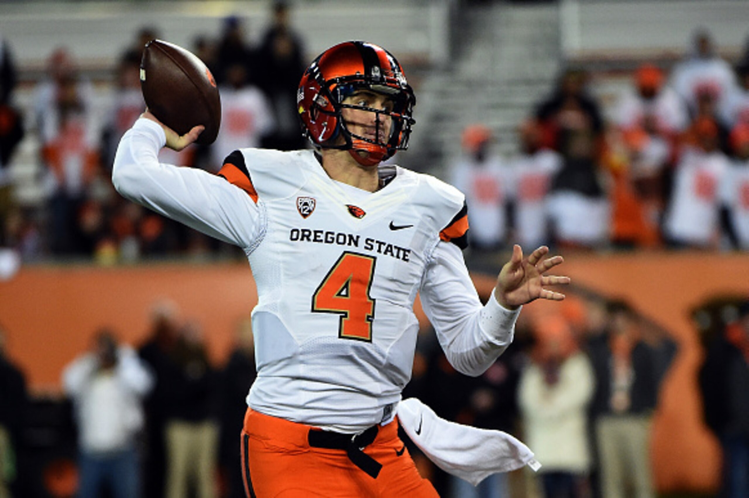 CORVALLIS, OR - NOVEMBER 29: Quarterback Sean Mannion #4 of the Oregon State Beavers passes the ball during the fourth quarter of the game against the Oregon Ducks at Reser Stadium on November 29, 2014 in Corvallis, Oregon. (Photo by Steve Dykes/Getty Ima