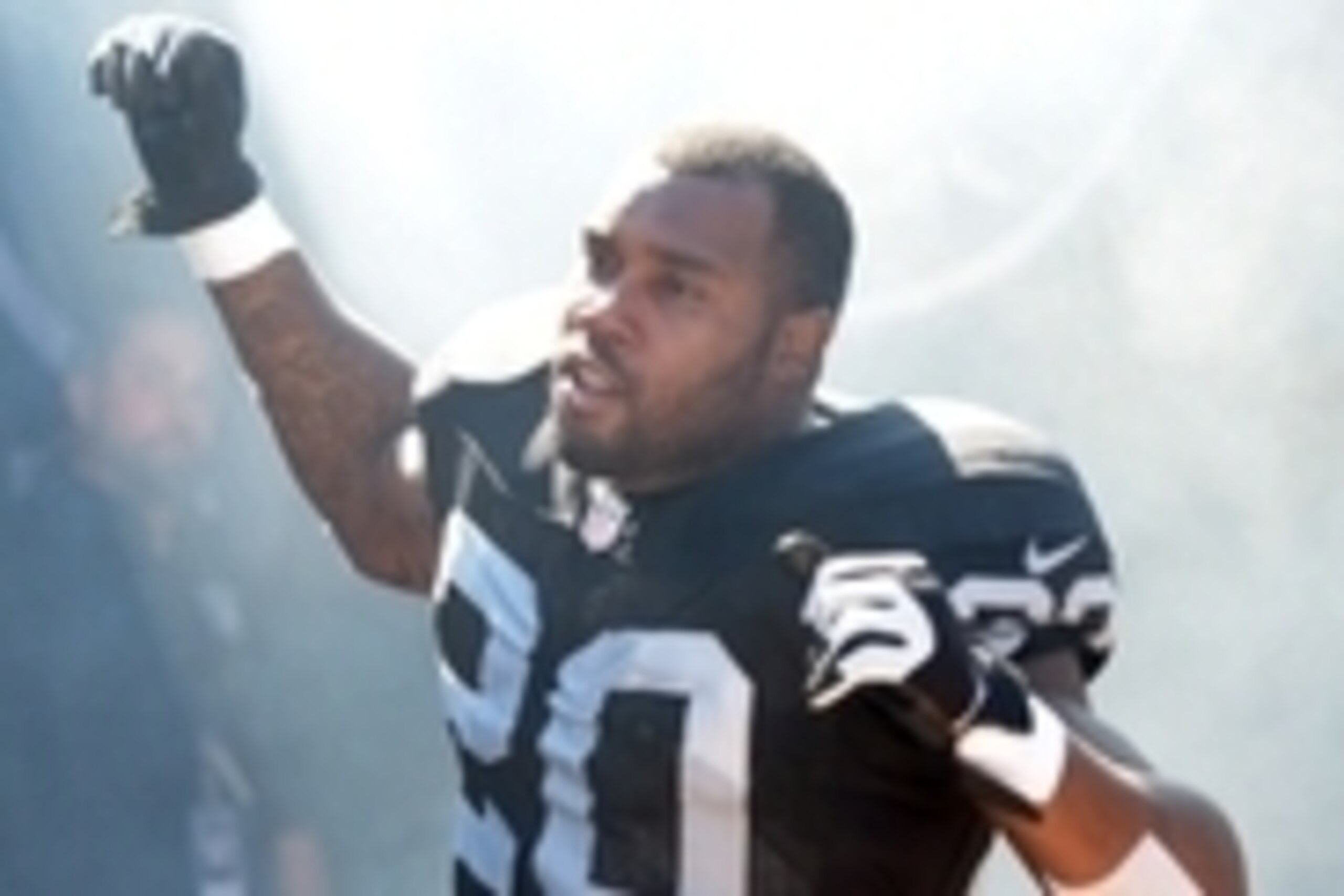 Oct 19, 2014; Oakland, CA, USA; Oakland Raiders running back Darren McFadden (20) is introduced before the game against the Arizona Cardinals at O.co Coliseum. Mandatory Credit: Kirby Lee-USA TODAY Sports