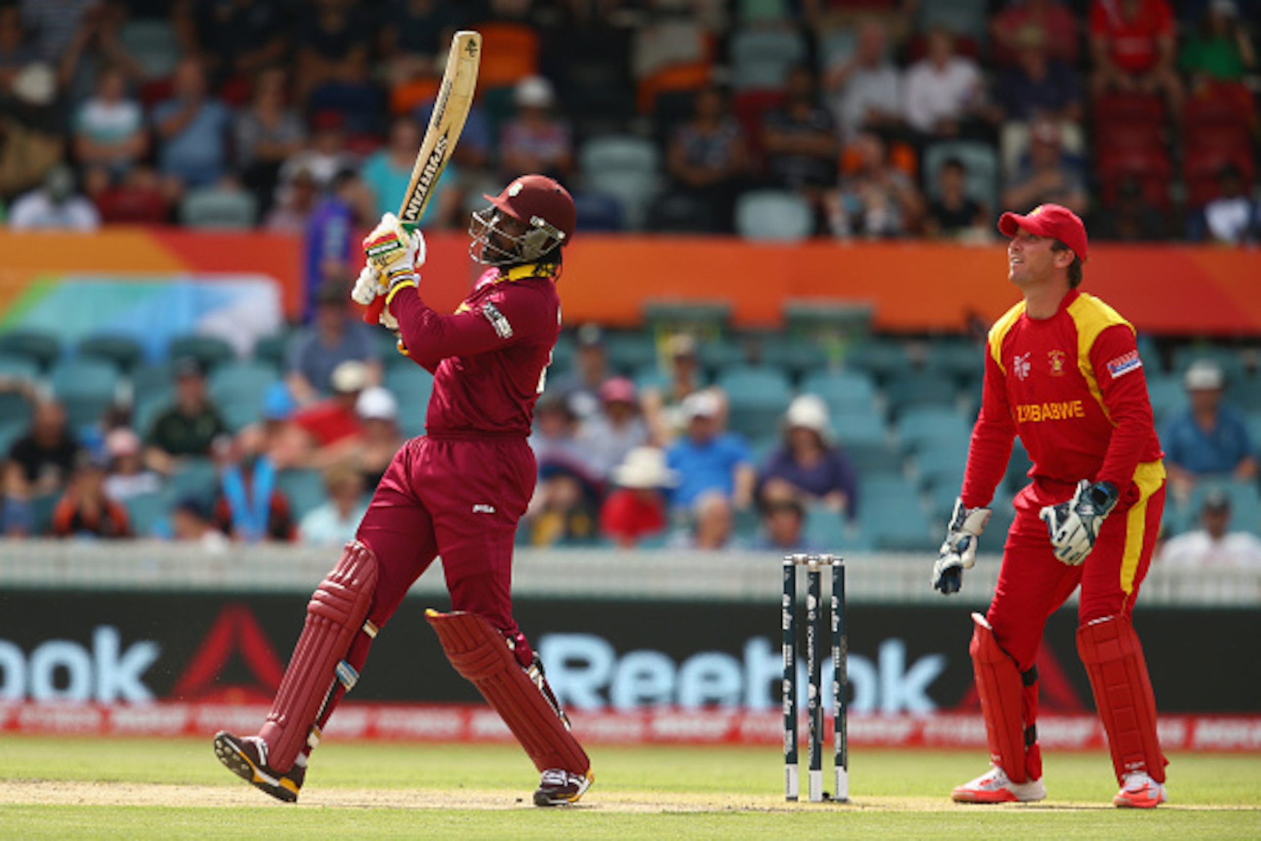 CANBERRA, AUSTRALIA - FEBRUARY 24:  Chris Gayle of West Indies bats during the 2015 ICC Cricket World Cup match between the West Indies and Zimbabwe at Manuka Oval on February 24, 2015 in Canberra, Australia.  (Photo by Mark Kolbe/Getty Images)