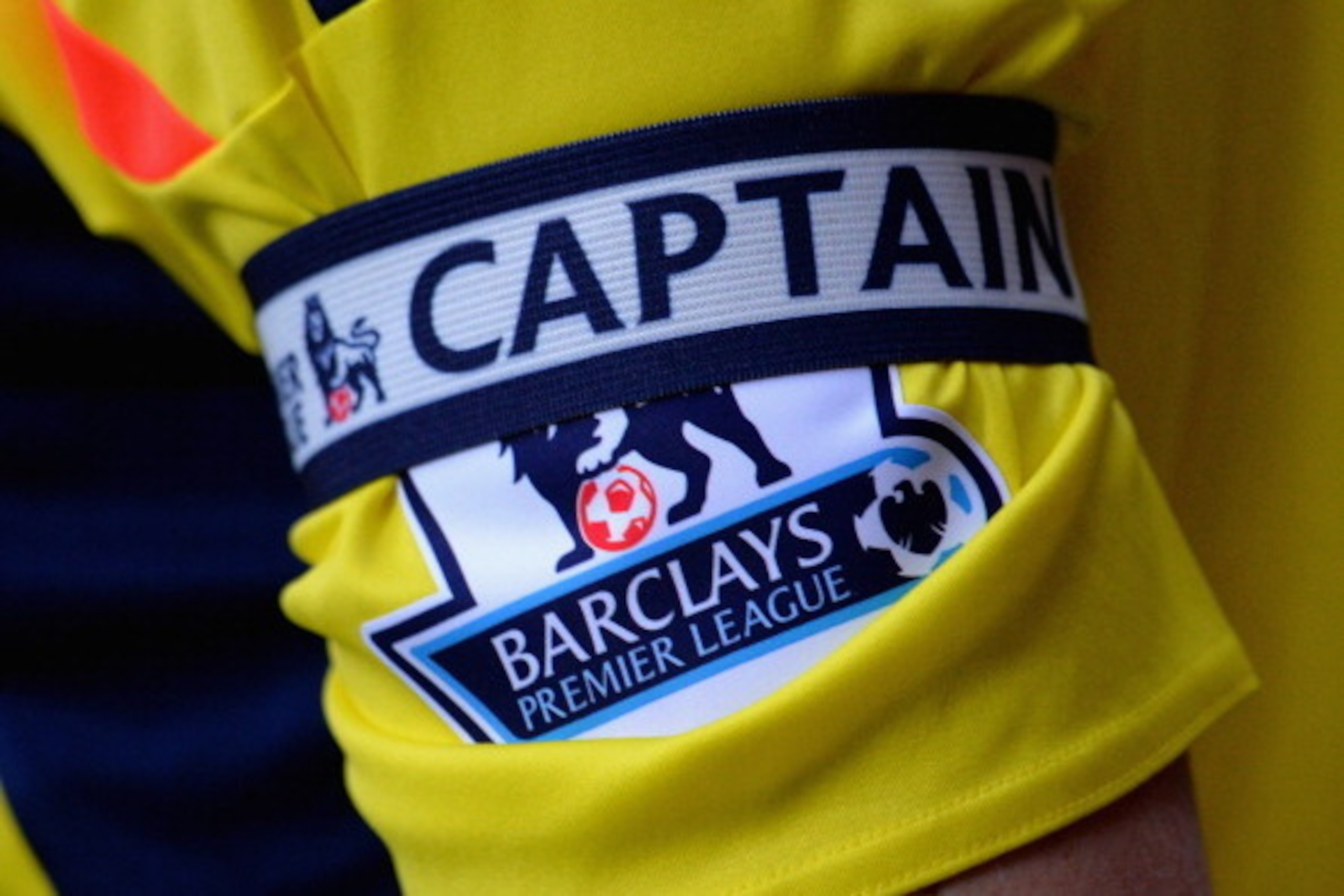 LONDON, ENGLAND - DECEMBER 14:  A Captains armband and the Barclays Premier League Logo is seen on the arm of John O'Shea of Sunderland during the Barclays Premier League match between West Ham United and Sunderland at Boleyn Ground on December 14, 2013 i