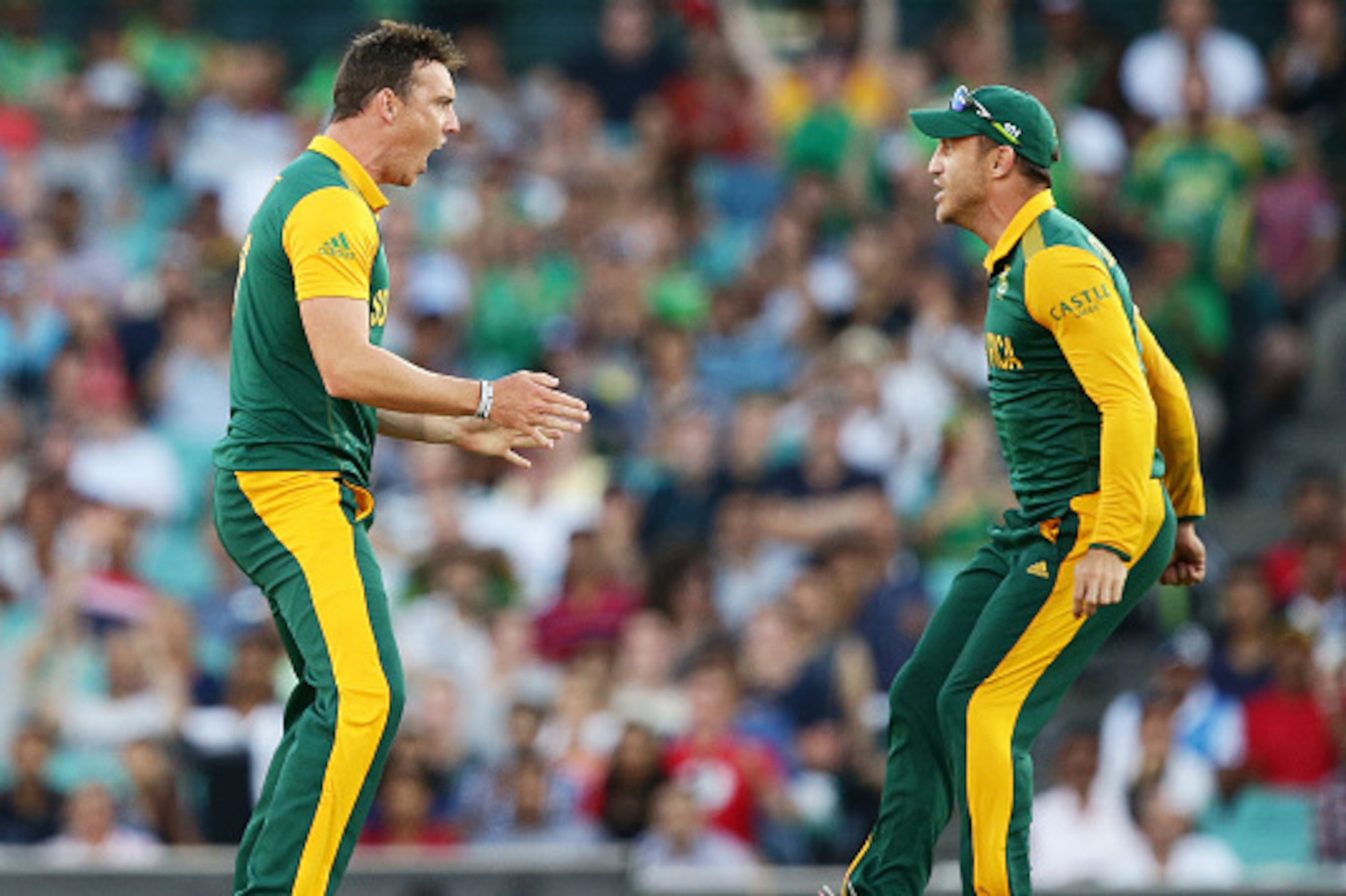 SYDNEY, AUSTRALIA - FEBRUARY 27: Kyle Abbott of South Africa (L) celebrates with Faf du Plessis (R) after taking the wicket of Chris Gayle of West Indies during the 2015 ICC Cricket World Cup match between South Africa and the West Indies at Sydney Crick SYDNEY, AUSTRALIA - FEBRUARY 27: Kyle Abbott of South Africa (L) celebrates with Faf du Plessis (R) after taking the wicket of Chris Gayle of West Indies during the 2015 ICC Cricket World Cup match between South Africa and the West Indies at Sydney Crick