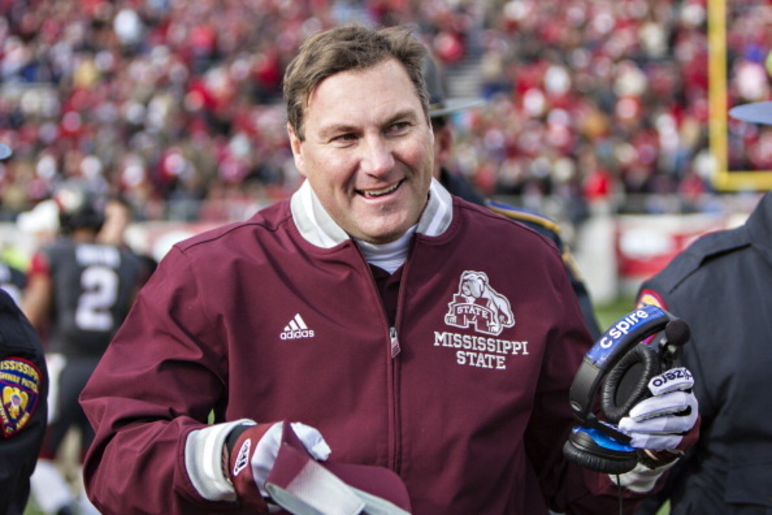 LITTLE ROCK, ARKANSAS - NOVEMBER 23:  Head Coach Dan Mullen of the Mississippi State Bulldogs smiles after winning a game in overtime against the Arkansas Razorbacks at War Memorial Stadium on November 23, 2013 in Little Rock, Arkansas.  The Bulldogs defe