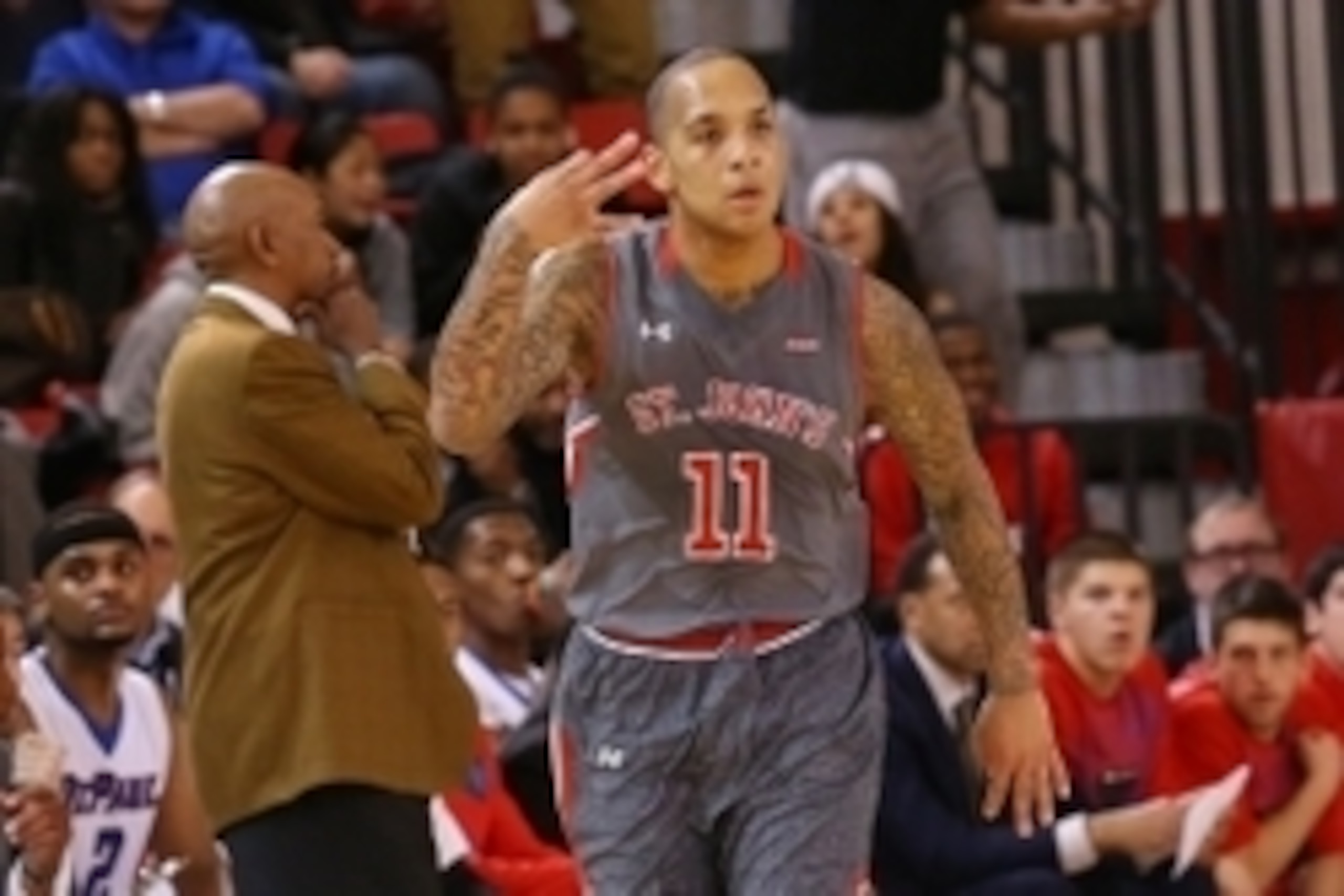 Feb 11, 2015; Jamaica, NY, USA; St. John's Red Storm guard D'Angelo Harrison (11) gestures after scoring a three-point basket during the first half against the DePaul Blue Demons at Carnesecca Arena. Mandatory Credit: Anthony Gruppuso-USA TODAY Sports