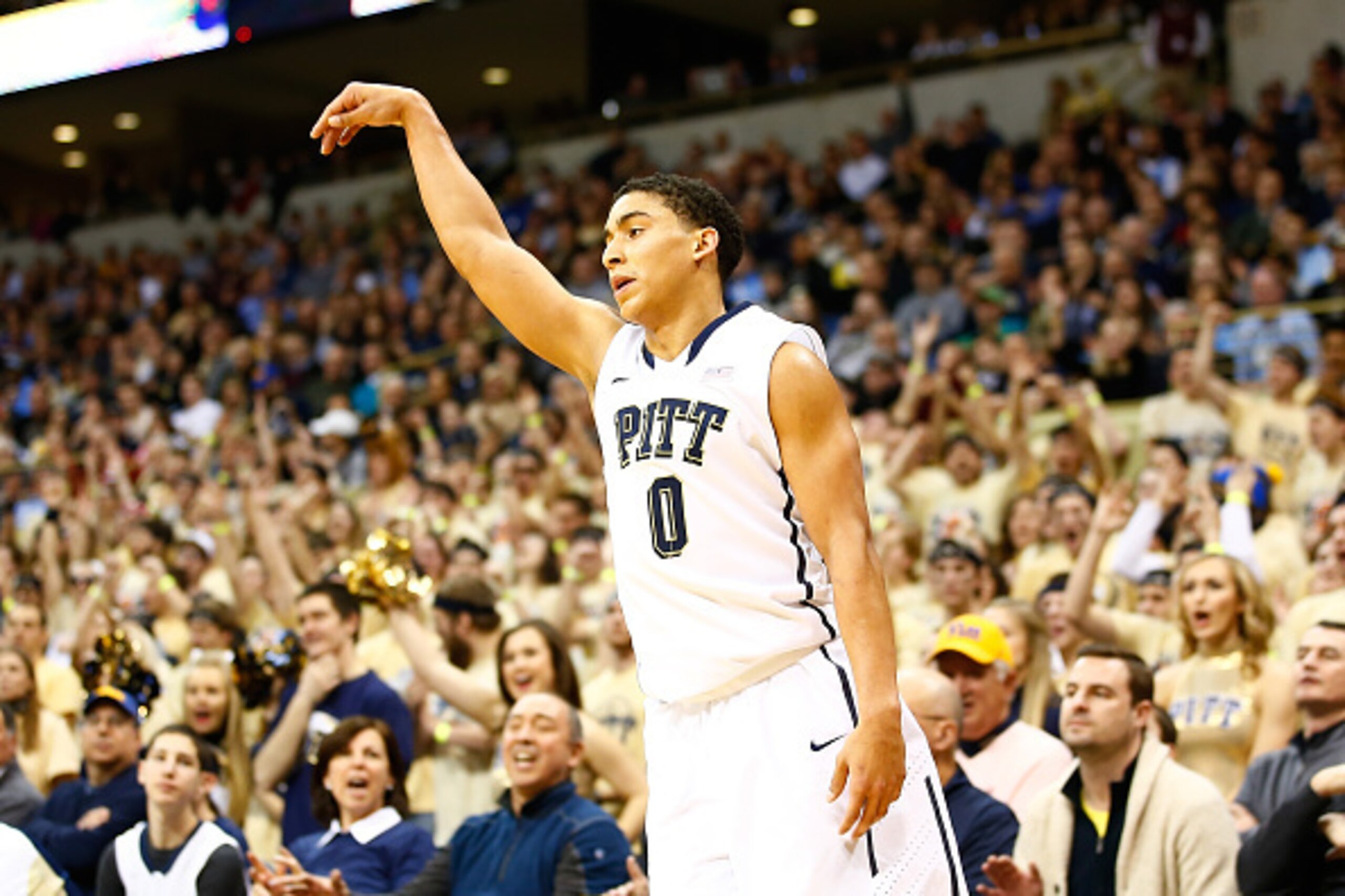 PITTSBURGH, PA - FEBRUARY 14: James Robinson #3 of the Pittsburgh Panthers reacts following his three-point shot in the second half against the North Carolina Tarheels during the game at Petersen Events Center on February 14, 2015 in Pittsburgh, Pennsylva