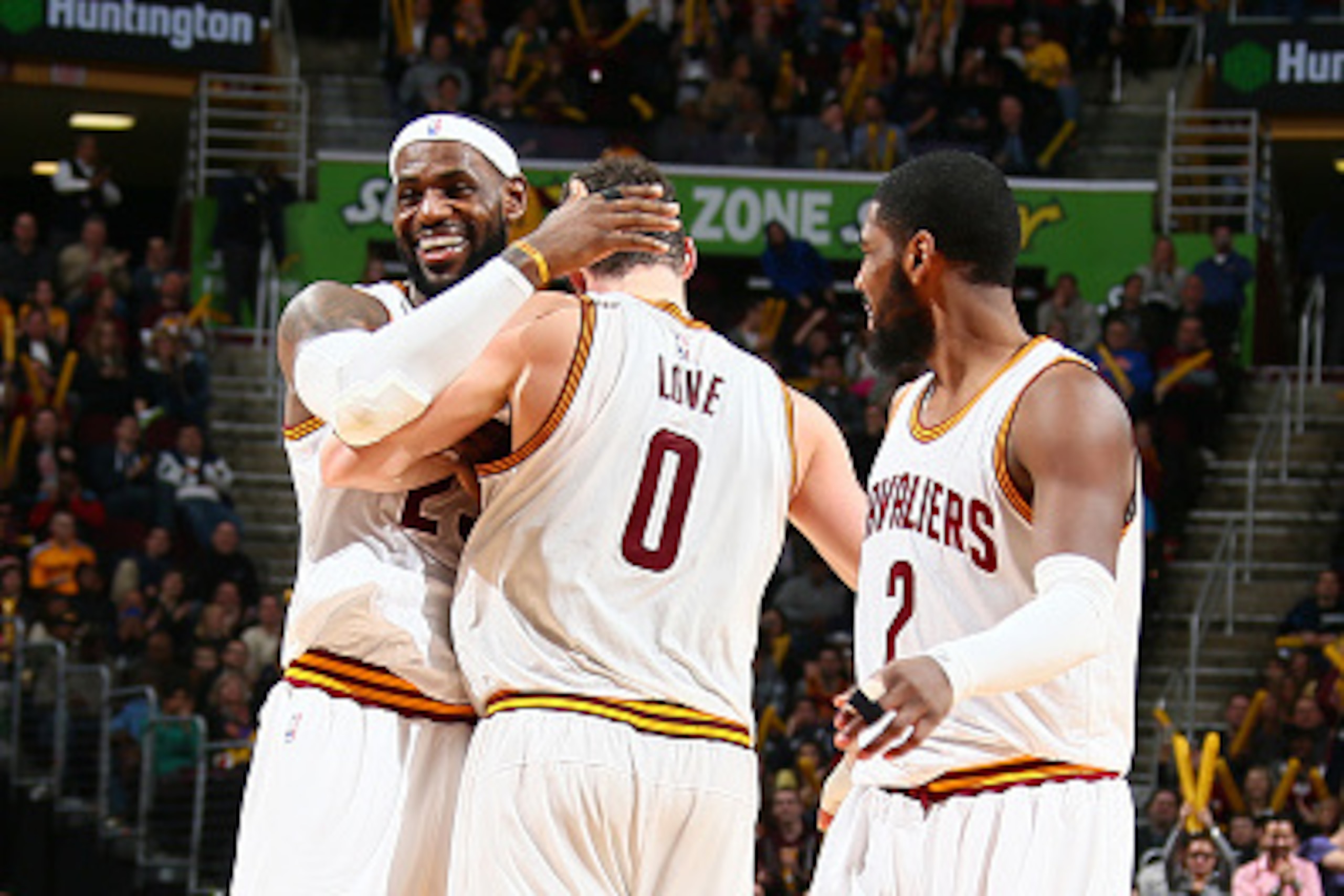CLEVELAND, OH - DECEMBER 23: LeBron James #23, Kevin Love #0, and Kyrie Irving #2 of the Cleveland Cavaliers celebrate during a game against the Minnesota Timberwolves during the game on December 23, 2014 at Quicken Loans Arena in Cleveland, Ohio.  NOTE T