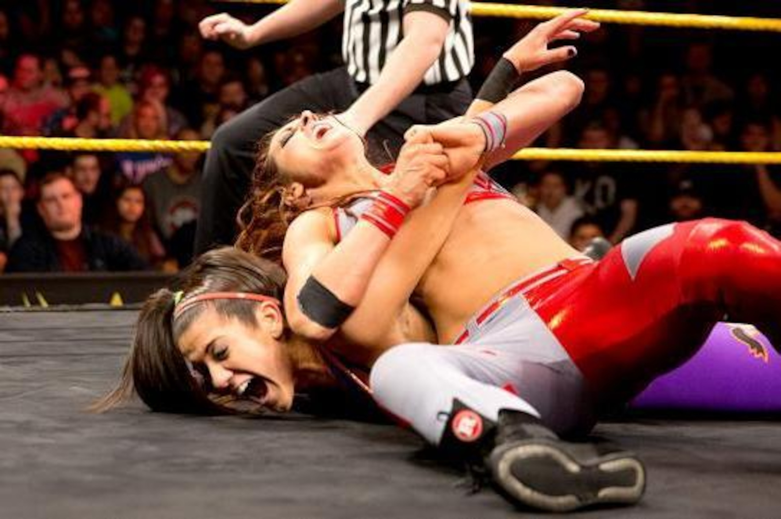 Becky Lynch applies the Fujiwara armbar.