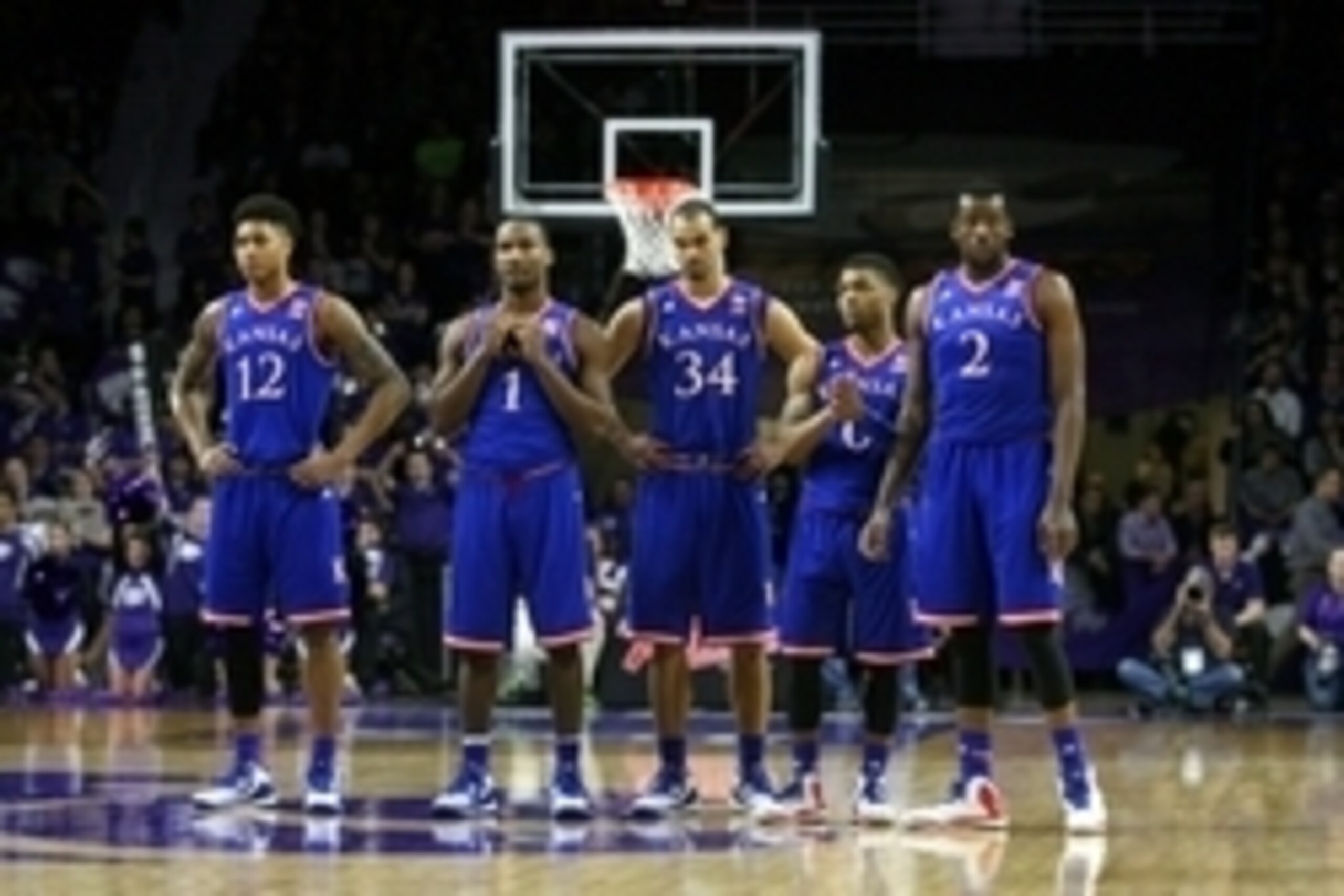 Feb 23, 2015; Manhattan, KS, USA; Kansas Jayhawks guard Kelly Oubre (12), guard Wayne Selden, Jr. (1), forward Perry Ellis (34), guard Frank Mason (0) and forward Cliff Alexander (2) look on during a 70-63 loss to the Kansas State Wildcats at Fred Bramlag