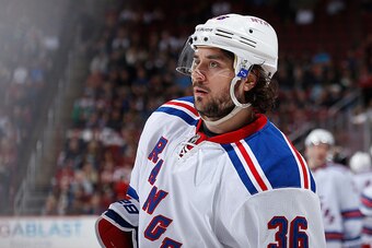 GLENDALE, AZ - FEBRUARY 14:  Mats Zuccarello #36  of the New York Rangers skates with the puck during the NHL game against the Arizona Coyotes at Gila River Arena on February 14, 2015 in Glendale, Arizona.  The Rangers defeated the Coyotes 5-1.  (Photo by