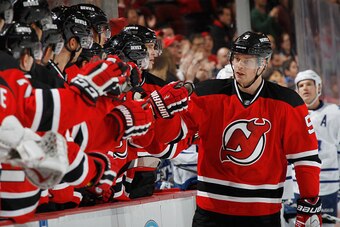 NEWARK, NJ - JANUARY 28: Adam Larsson #5 of the New Jersey Devils celebrates his third period game tying goal against the Toronto Maple Leafs at the Prudential Center on January 28, 2015 in Newark, New Jersey. The Devils defeated the Maple Leafs 2-1 in th