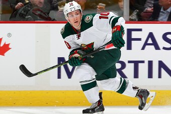 VANCOUVER, BC - FEBRUARY 16:  Jordan Schroeder #10 of the Minnesota Wild skates up ice during their NHL game against the Vancouver Canucks at Rogers Arena February 16, 2015 in Vancouver, British Columbia, Canada.  (Photo by Jeff Vinnick/NHLI via Getty Ima