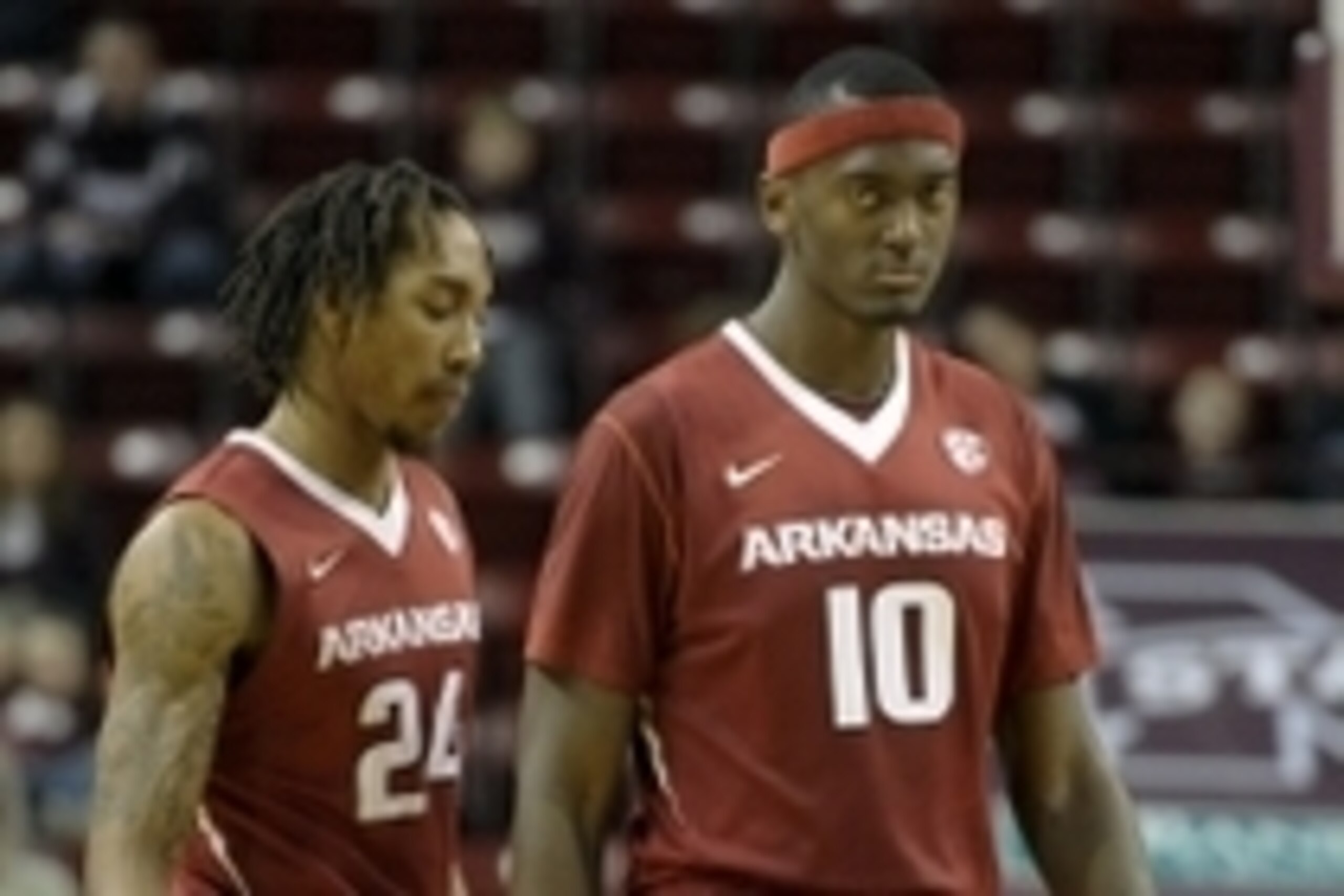 Feb 21, 2015; Starkville, MS, USA; Arkansas Razorbacks guard Michael Qualls (24) and forward Bobby Portis (10) during the game at Humphrey Coliseum. Arkansas Razorbacks beat Mississippi State Bulldogs 65-61. Mandatory Credit: Justin Ford-USA TODAY Sports