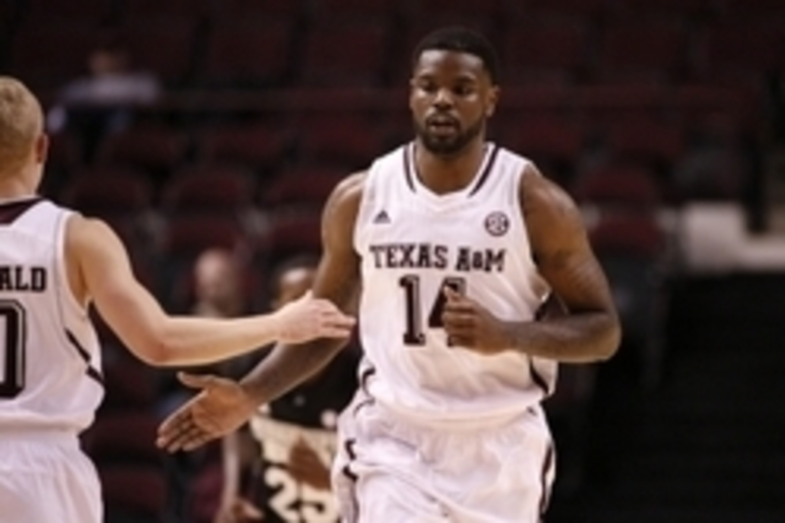 Feb 5, 2014; College Station, TX, USA; Texas A&M Aggies forward Kourtney Roberson (14) celebrates with guard Blake McDonald (L) after scoring during the first half against the Mississippi State Bulldogs at Reed Arena. Mandatory Credit: Soobum Im-USA TODAY Feb 5, 2014; College Station, TX, USA; Texas A&M Aggies forward Kourtney Roberson (14) celebrates with guard Blake McDonald (L) after scoring during the first half against the Mississippi State Bulldogs at Reed Arena. Mandatory Credit: Soobum Im-USA TODAY
