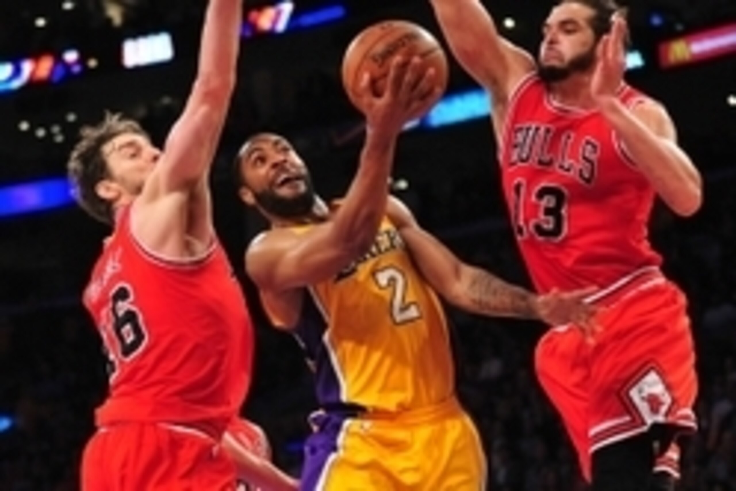 January 29, 2015; Los Angeles, CA, USA; Los Angeles Lakers guard Wayne Ellington (2) goes in for a basket against the defense of Chicago Bulls forward Pau Gasol (16) and center Joakim Noah (13) during the first overtime period at Staples Center. Mandatory