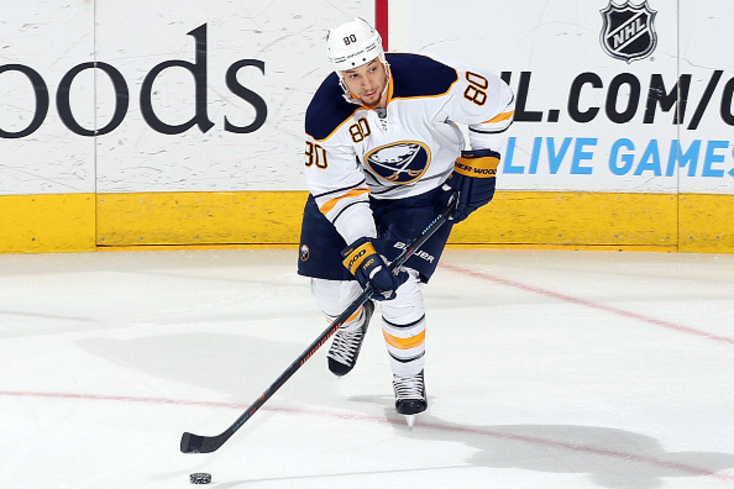 RALEIGH, NC - JANUARY 08: Chris Stewart #80 of the Buffalo Sabres looks to pass the puck during their NHL game against the Carolina Hurricanes at PNC Arena on January 8, 2015 in Raleigh, North Carolina.  (Photo by Gregg Forwerck/NHLI via Getty Images)