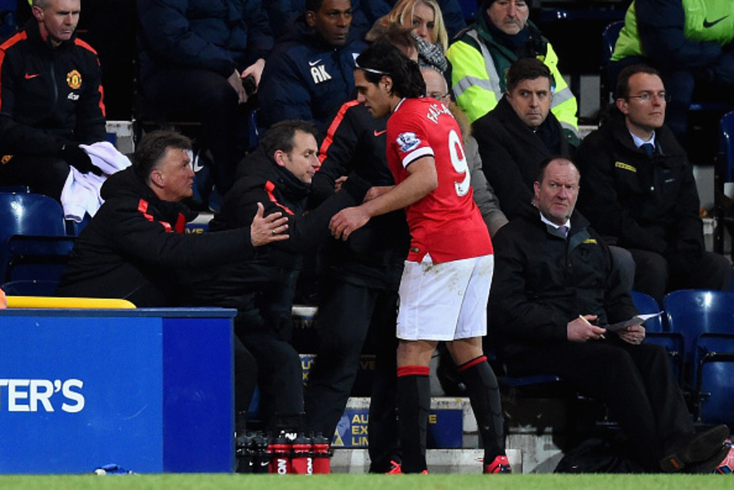 PRESTON, ENGLAND - FEBRUARY 16: Manager Louis van Gaal of Manchester United shakes hands with Radamel Falcao García of Manchester United as he is replaced during the FA Cup Fifth round match between Preston North End and Manchester United at Deepdale on F