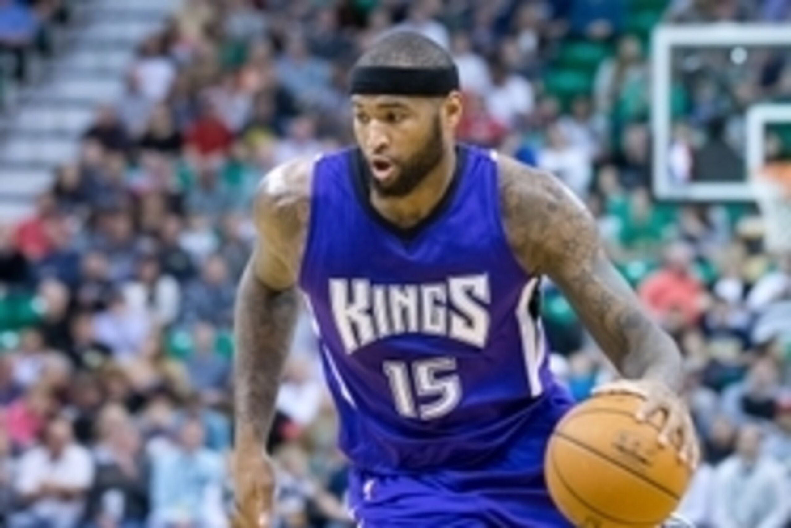 Feb 7, 2015; Salt Lake City, UT, USA; Sacramento Kings center DeMarcus Cousins (15) dribbles the ball during the first half against the Utah Jazz at EnergySolutions Arena. Mandatory Credit: Russ Isabella-USA TODAY Sports