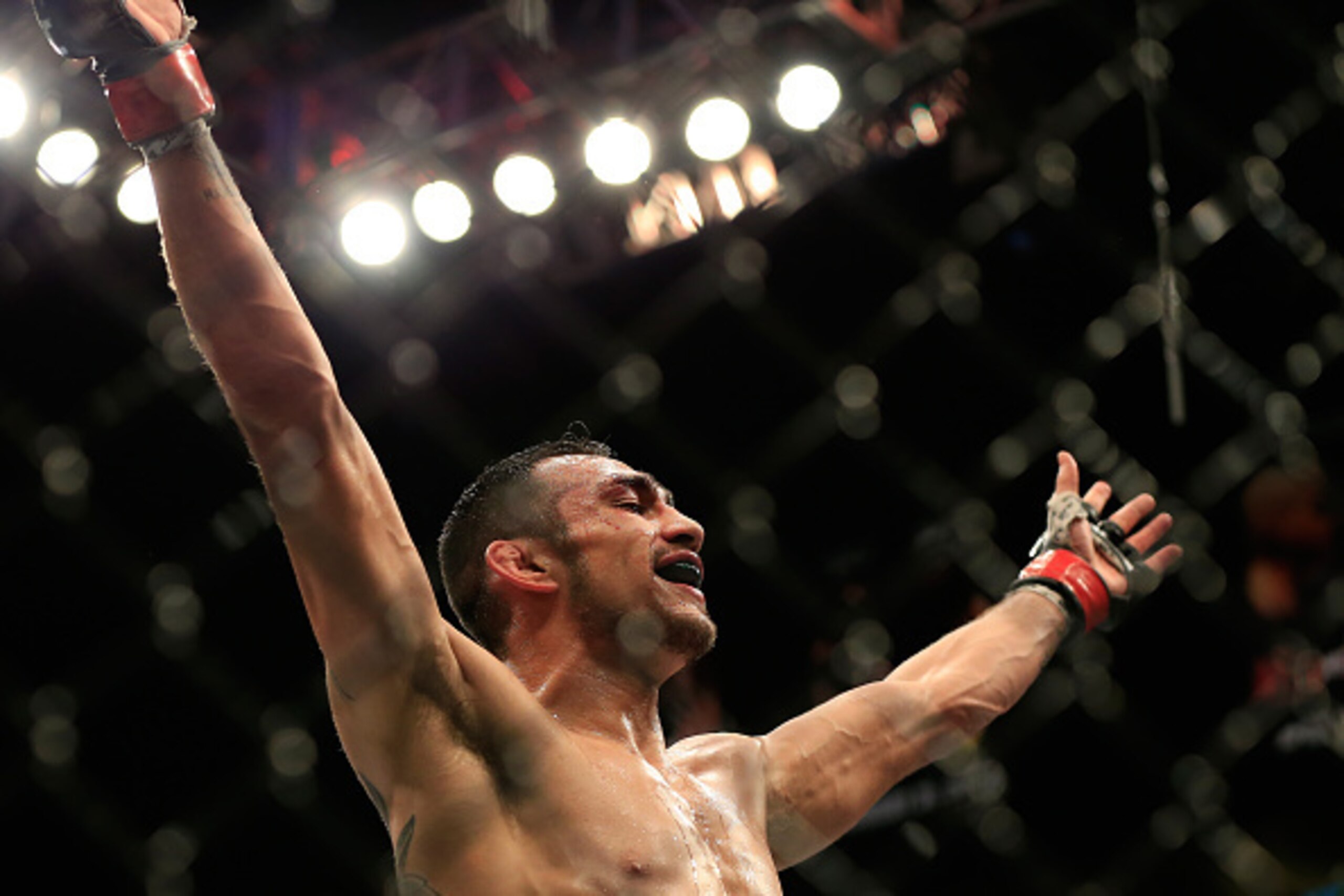 LAS VEGAS, NV - DECEMBER 06:  Tony Ferguson celebrates after defeating Abel Trujillo in their fight during the UFC 181 event at the Mandalay Bay Events Center on December 6, 2014 in Las Vegas, Nevada.  (Photo by Alex Trautwig/Getty Images)