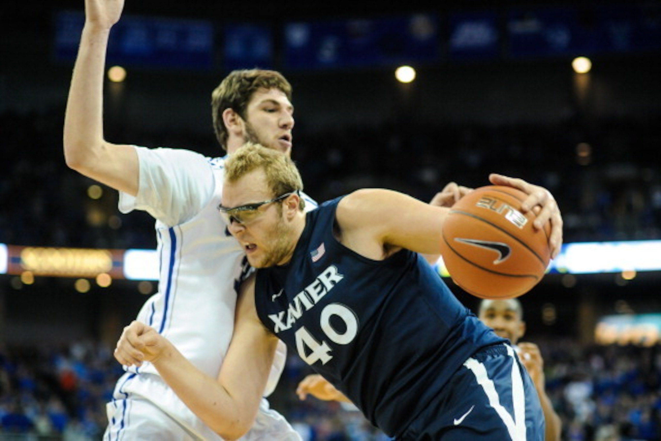 OMAHA, NE - JANUARY12: Will Artino #31 of the Creighton Bluejays guards Matt Stainbrook #40 of the Xavier Musketeers during their game at the CenturyLink Center on January 12, 2014 in Omaha, Nebraska. (Photo by Eric Francis/Getty Images) OMAHA, NE - JANUARY12: Will Artino #31 of the Creighton Bluejays guards Matt Stainbrook #40 of the Xavier Musketeers during their game at the CenturyLink Center on January 12, 2014 in Omaha, Nebraska. (Photo by Eric Francis/Getty Images)