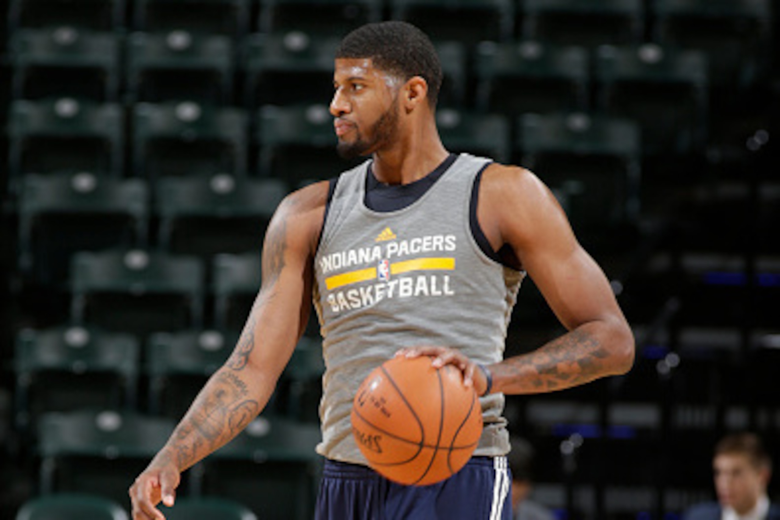 INDIANAPOLIS - FEBRUARY 27: Paul George #13 of the Indiana Pacers warms up before a game against the Cleveland Cavaliers at Bankers Life Fieldhouse on February 27, 2015 in Indianapolis, Indiana.  NOTE TO USER: User expressly acknowledges and agrees that, 