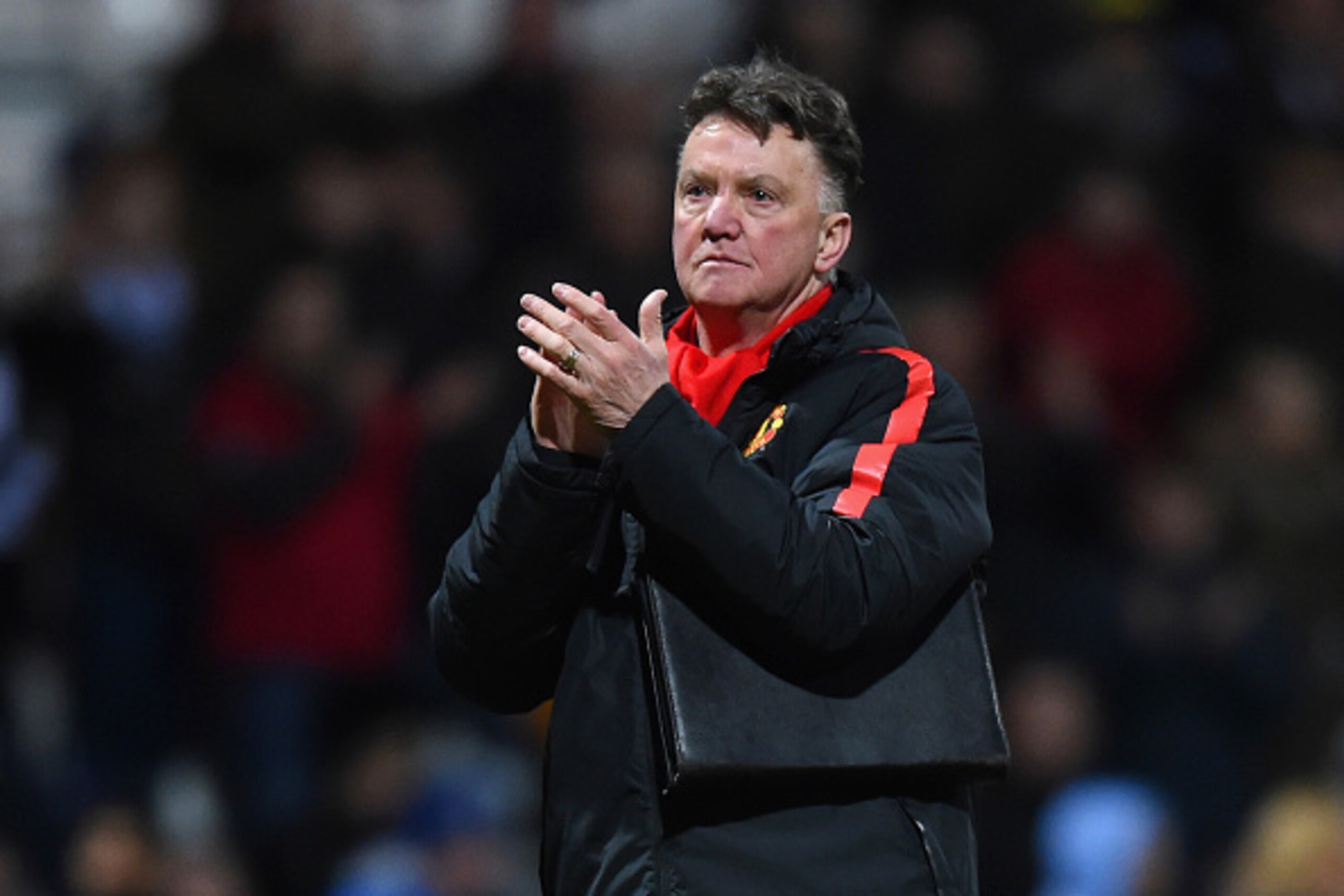 PRESTON, ENGLAND - FEBRUARY 16:  Manager Louis van Gaal of Manchester United applauds the fans during the FA Cup Fifth round match between Preston North End and Manchester United at Deepdale on February 16, 2015 in Preston, England  (Photo by Michael Rega