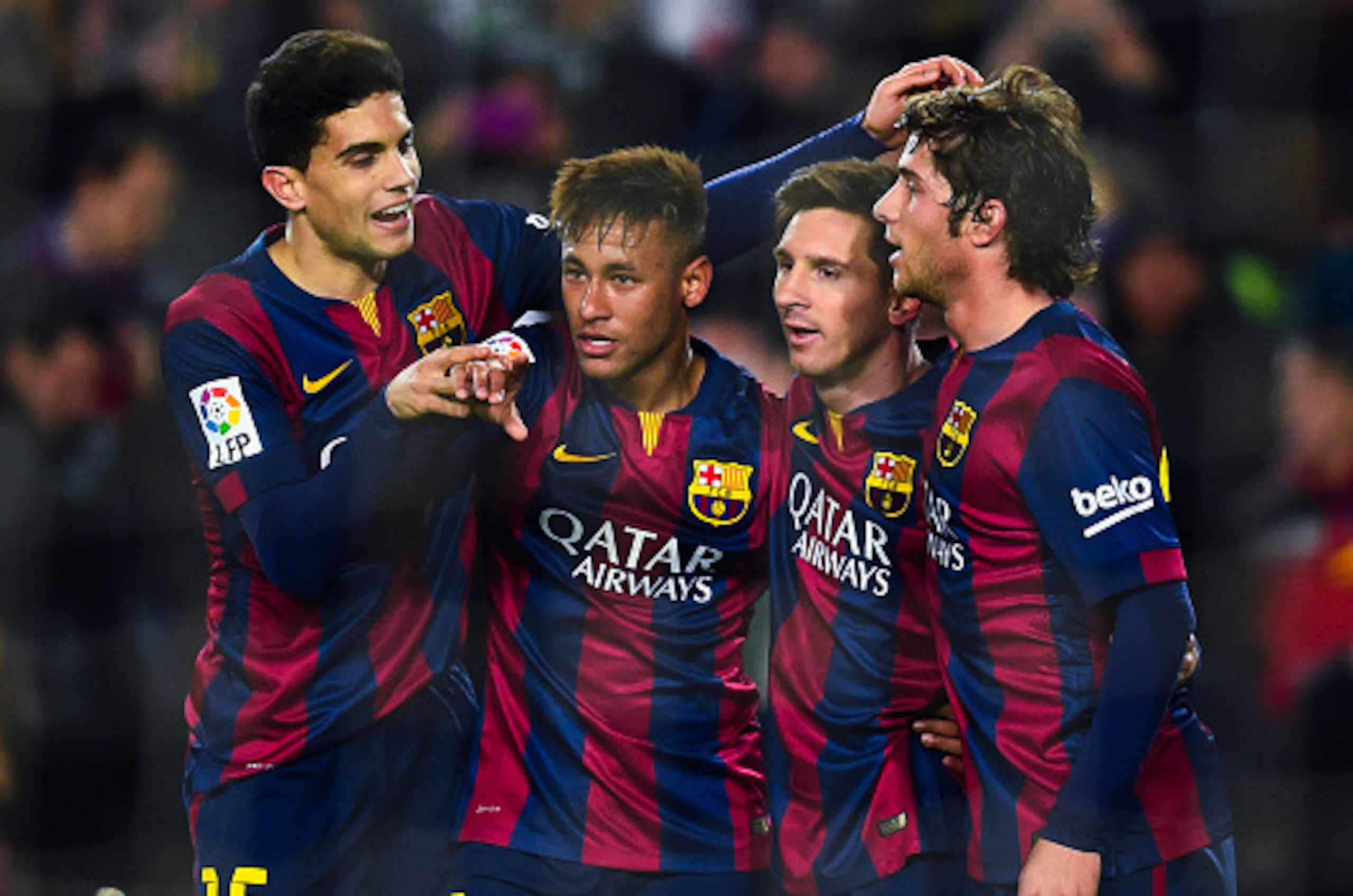 BARCELONA, SPAIN - JANUARY 08:  Neymar (2ndL) of FC Barcelona  celebrates with his teammates (L-R) Marc Bartra, Lionel Messi and Sergio Roberto scoring the opening goal during the Copa del Rey Round of 16 First Leg match between FC Barcelona and Elche CF 