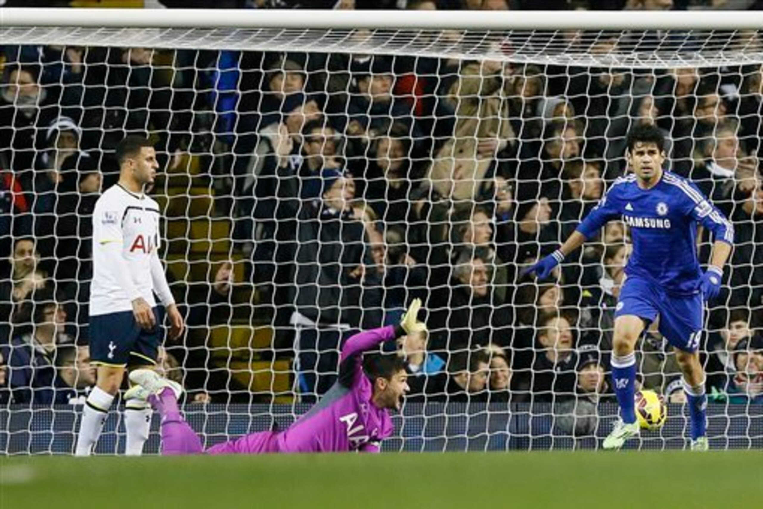 Diego Costa wheels away in celebration after opening the scoring for Chelsea against Spurs last month.