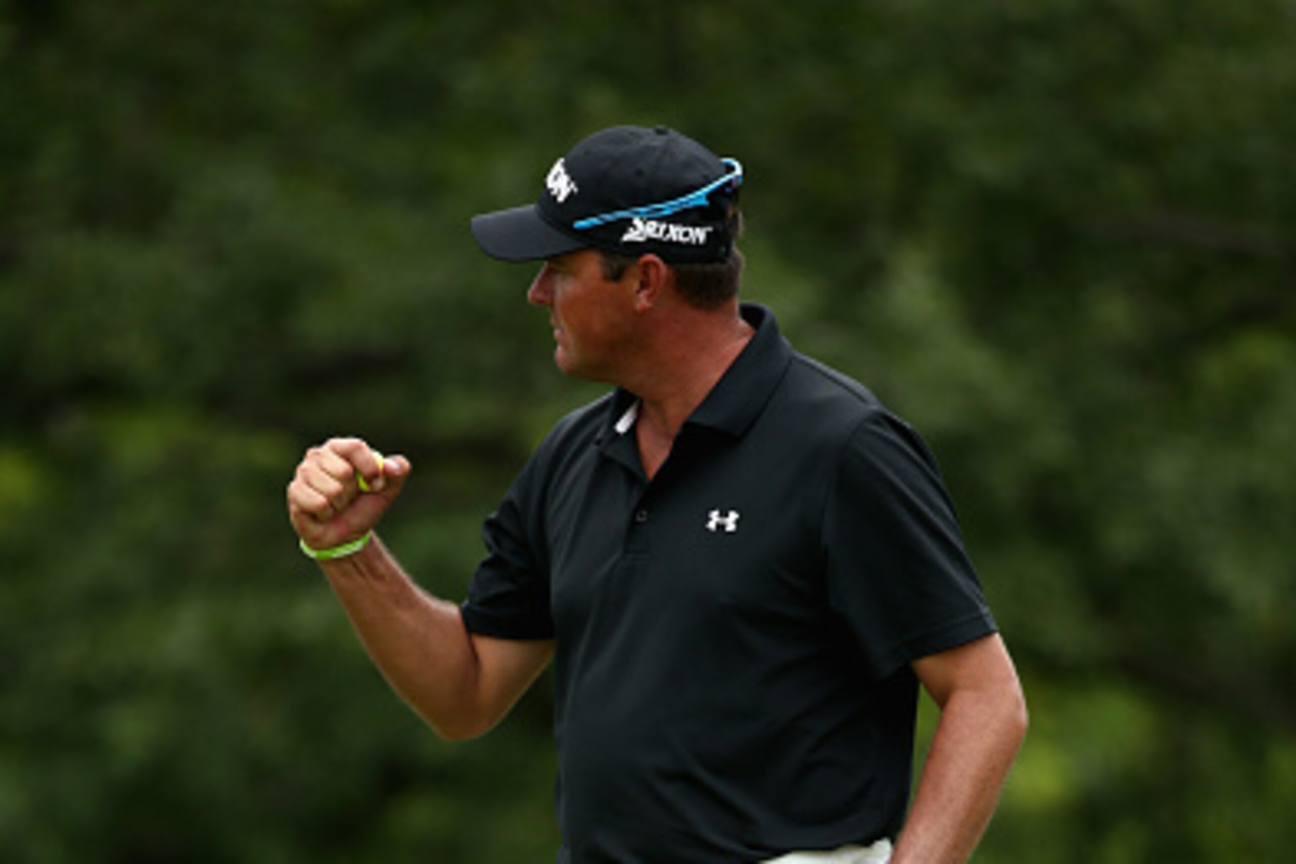 JOHANNESBURG, SOUTH AFRICA - FEBRUARY 28:  Wallie Coetsee of South Africa celebrates a birdie on the 18th green during the third round of the Joburg Open at Royal Johannesburg and Kensington Golf Club on February 28, 2015 in Johannesburg, South Africa.  (