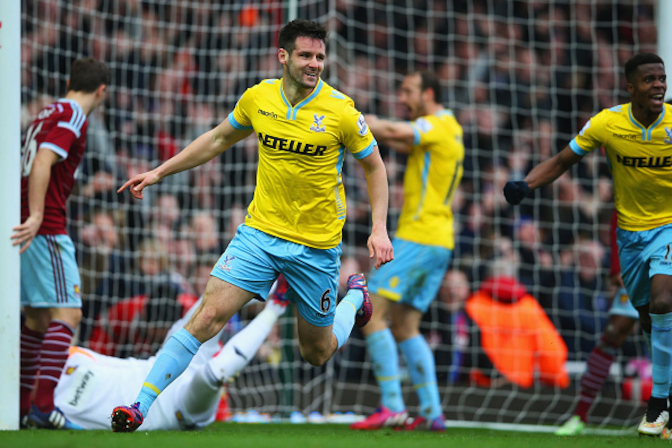 LONDON, ENGLAND - FEBRUARY 28:  Scott Dann of Crystal Palace (6) celebrates as he scores their second goal during the Barclays Premier League match between West Ham United and Crystal Palace at Boleyn Ground on February 28, 2015 in London, England.  (Phot