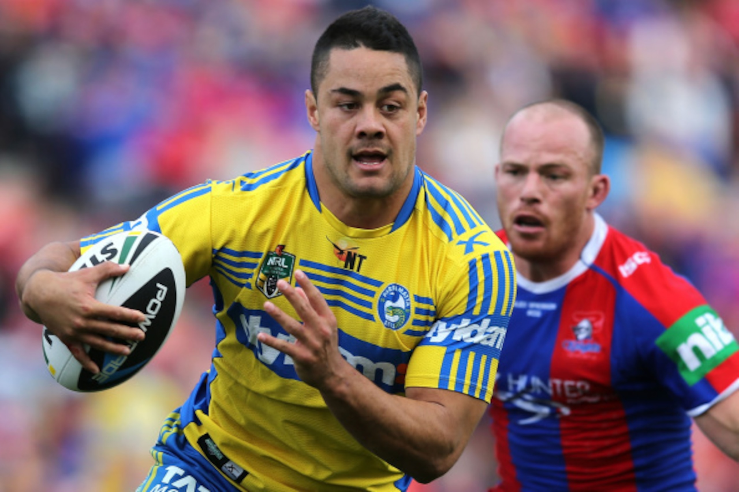NEWCASTLE, AUSTRALIA - AUGUST 30: Jarryd Hayne of the Eels in action during the round 25 NRL match between the Newcastle Knights and the Parramatta Eels at Hunter Stadium on August 30, 2014 in Newcastle, Australia.  (Photo by Ashley Feder/Getty Images)