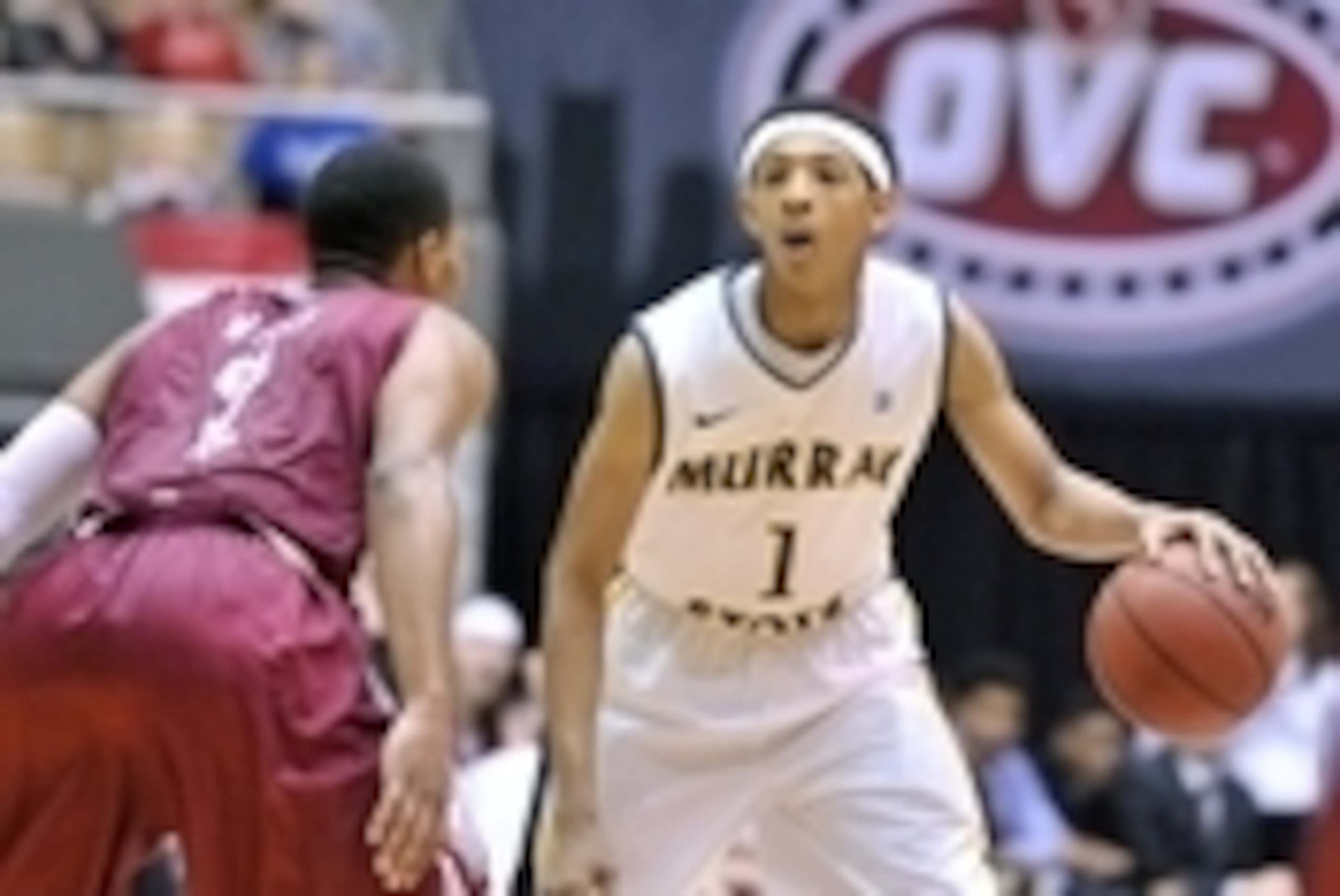 Mar 7, 2014; Nashville, TN, USA; Murray State Racers guard Cameron Payne (1) controls the ball against Eastern Kentucky Colonels guard Corey Walden (2) during the second half in the semifinals of the Ohio Valley Conference basketball tournament at Nashvil Mar 7, 2014; Nashville, TN, USA; Murray State Racers guard Cameron Payne (1) controls the ball against Eastern Kentucky Colonels guard Corey Walden (2) during the second half in the semifinals of the Ohio Valley Conference basketball tournament at Nashvil