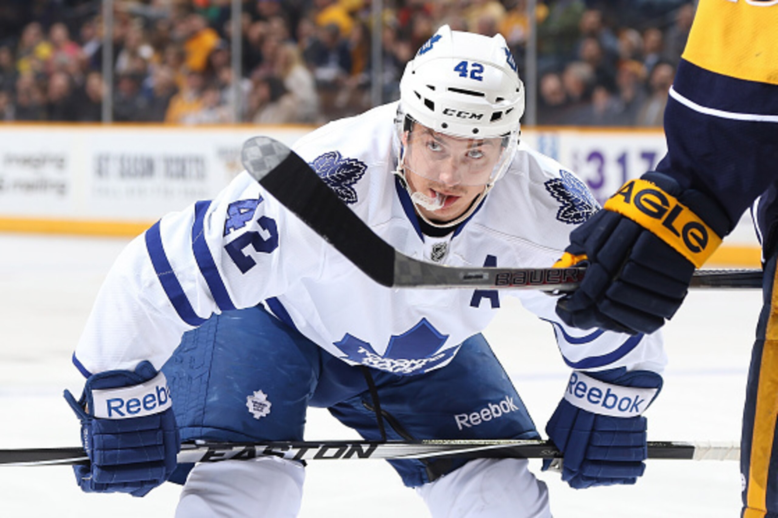 NASHVILLE, TN - FEBRUARY 3: Tyler Bozak #42 of the Toronto Maple Leafs gets ready for a face-off against the Nashville Predators during an NHL game at Bridgestone Arena on February 3, 2015 in Nashville, Tennessee. (Photo by John Russell/NHLI via Getty Ima NASHVILLE, TN - FEBRUARY 3: Tyler Bozak #42 of the Toronto Maple Leafs gets ready for a face-off against the Nashville Predators during an NHL game at Bridgestone Arena on February 3, 2015 in Nashville, Tennessee. (Photo by John Russell/NHLI via Getty Ima