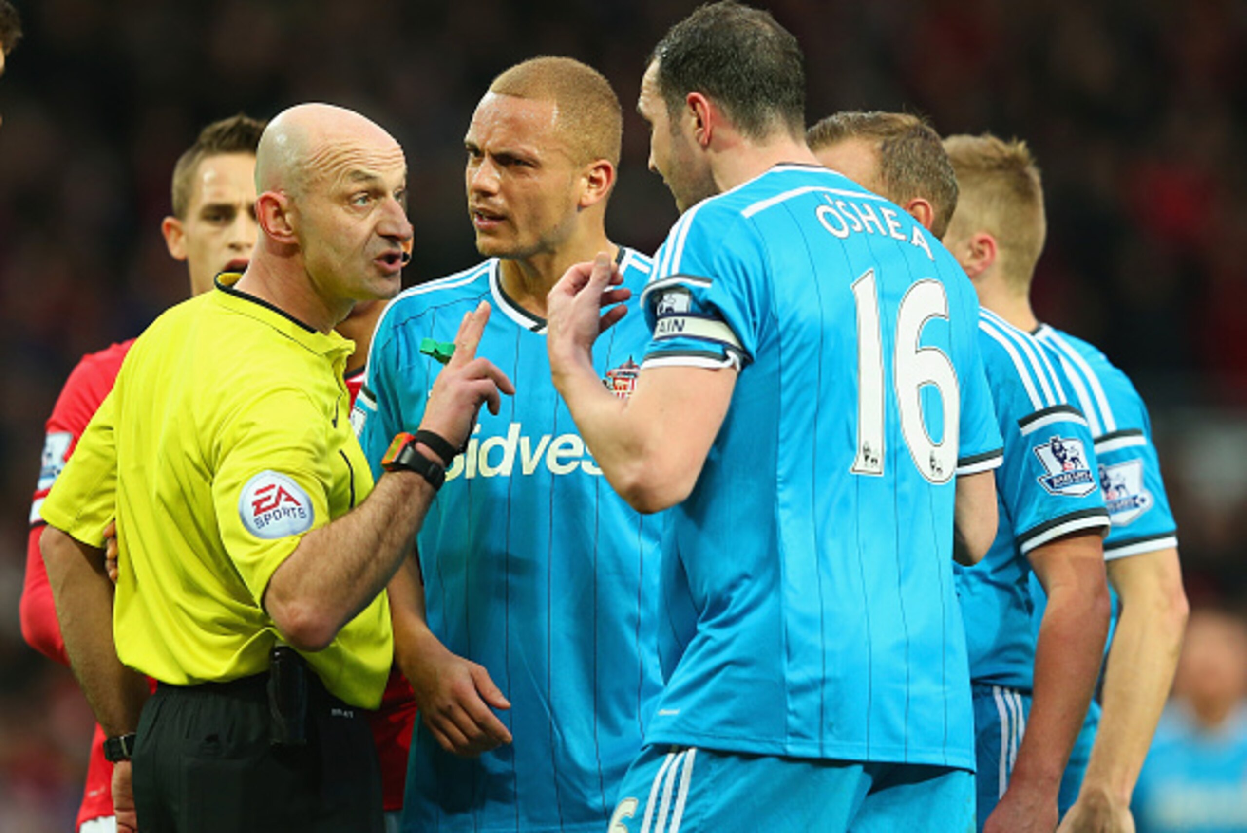 MANCHESTER, ENGLAND - FEBRUARY 28:  Wes Brown of Sunderland reacts after being shown a straight red card by Refere Roger East as John O'Shea of Sunderland appeals during the Barclays Premier League match between Manchester United and Sunderland at Old Tra