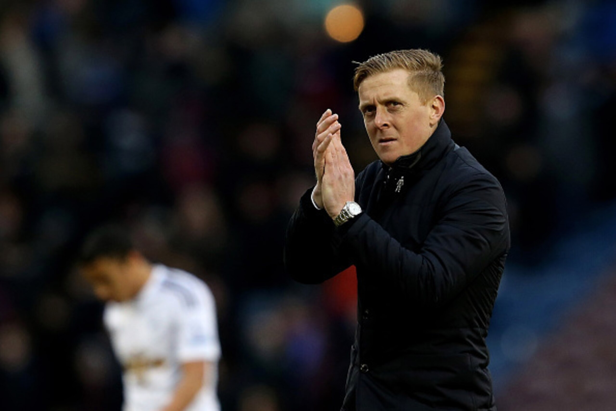 BURNLEY, ENGLAND - FEBRUARY 28:  Garry Monk the manager of Swansea City applauds the fans folloiwing his team's 1-0 victory during the Barclays Premier League match between Burnley and Swansea City at Turf Moor on February 28, 2015 in Burnley, England.  (