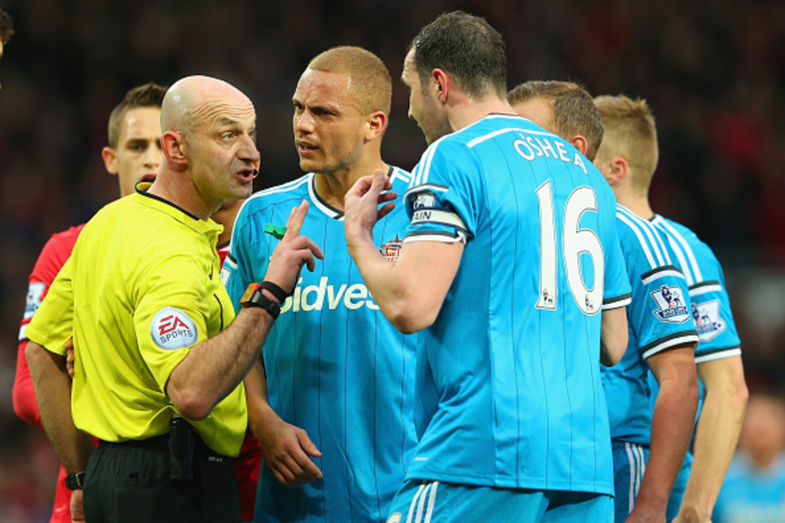 MANCHESTER, ENGLAND - FEBRUARY 28:  Wes Brown of Sunderland reacts after being shown a straight red card by Refere Roger East as John O'Shea of Sunderland appeals during the Barclays Premier League match between Manchester United and Sunderland at Old Tra