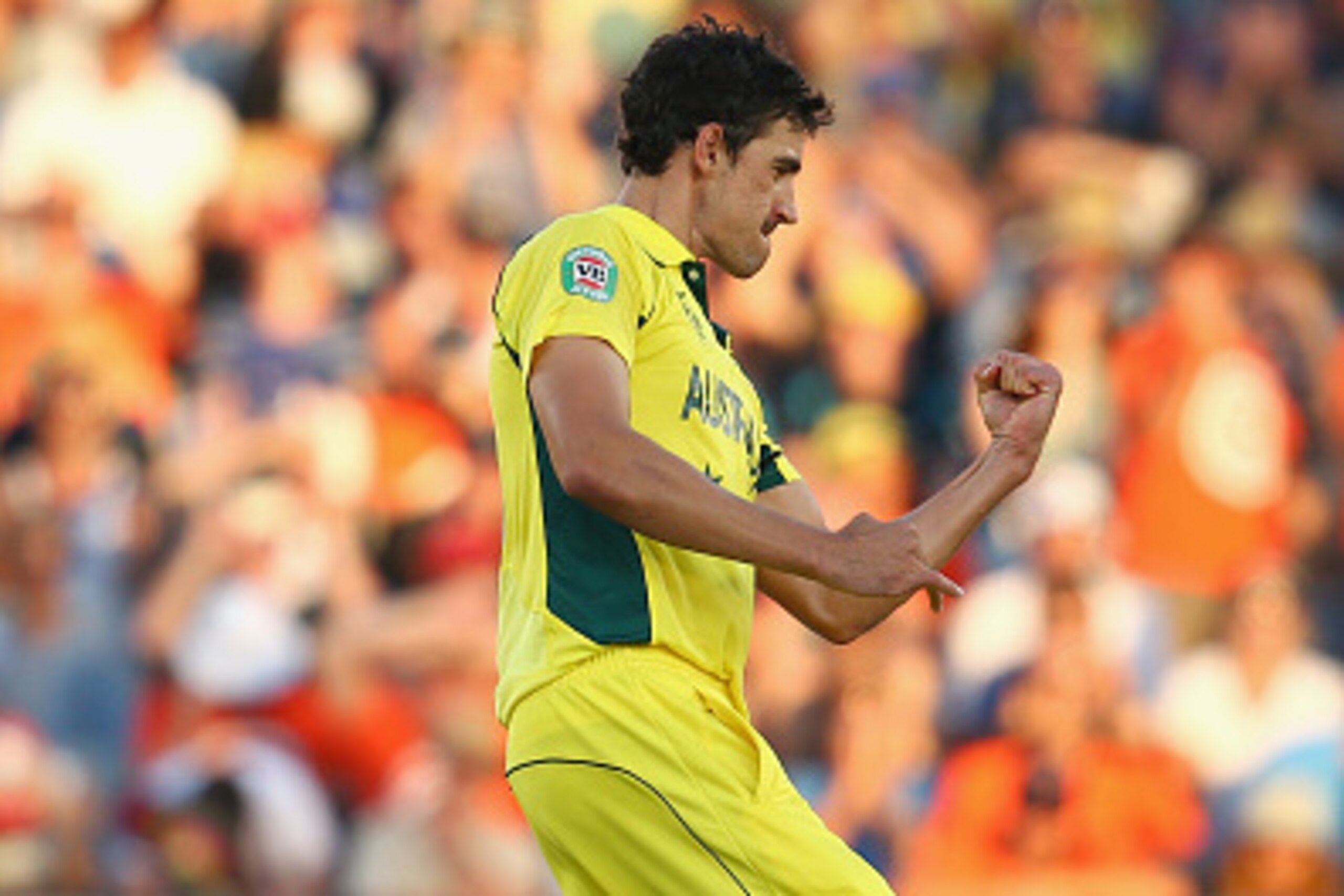 AUCKLAND, NEW ZEALAND - FEBRUARY 28:  Mitchell Starc of Australia celebrates taking the wicket of Adam Milne of New Zealand during the 2015 ICC Cricket World Cup match between Australia and New Zealand at Eden Park on February 28, 2015 in Auckland, New Ze
