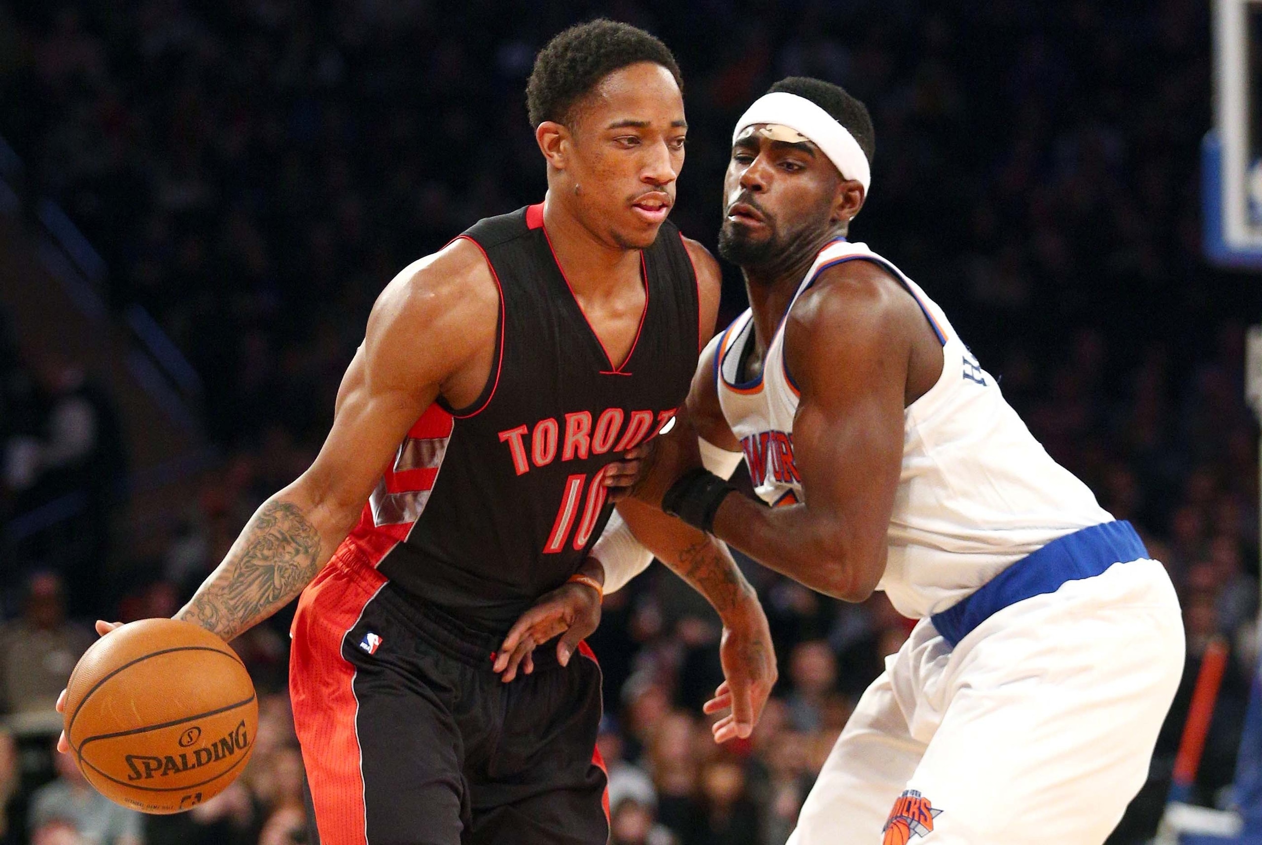 Feb 28, 2015; New York, NY, USA; Toronto Raptors shooting guard DeMar DeRozan (10) controls the ball against New York Knicks shooting guard Tim Hardaway Jr. (5) during the first quarter at Madison Square Garden. Mandatory Credit: Brad Penner-USA TODAY Spo Feb 28, 2015; New York, NY, USA; Toronto Raptors shooting guard DeMar DeRozan (10) controls the ball against New York Knicks shooting guard Tim Hardaway Jr. (5) during the first quarter at Madison Square Garden. Mandatory Credit: Brad Penner-USA TODAY Spo