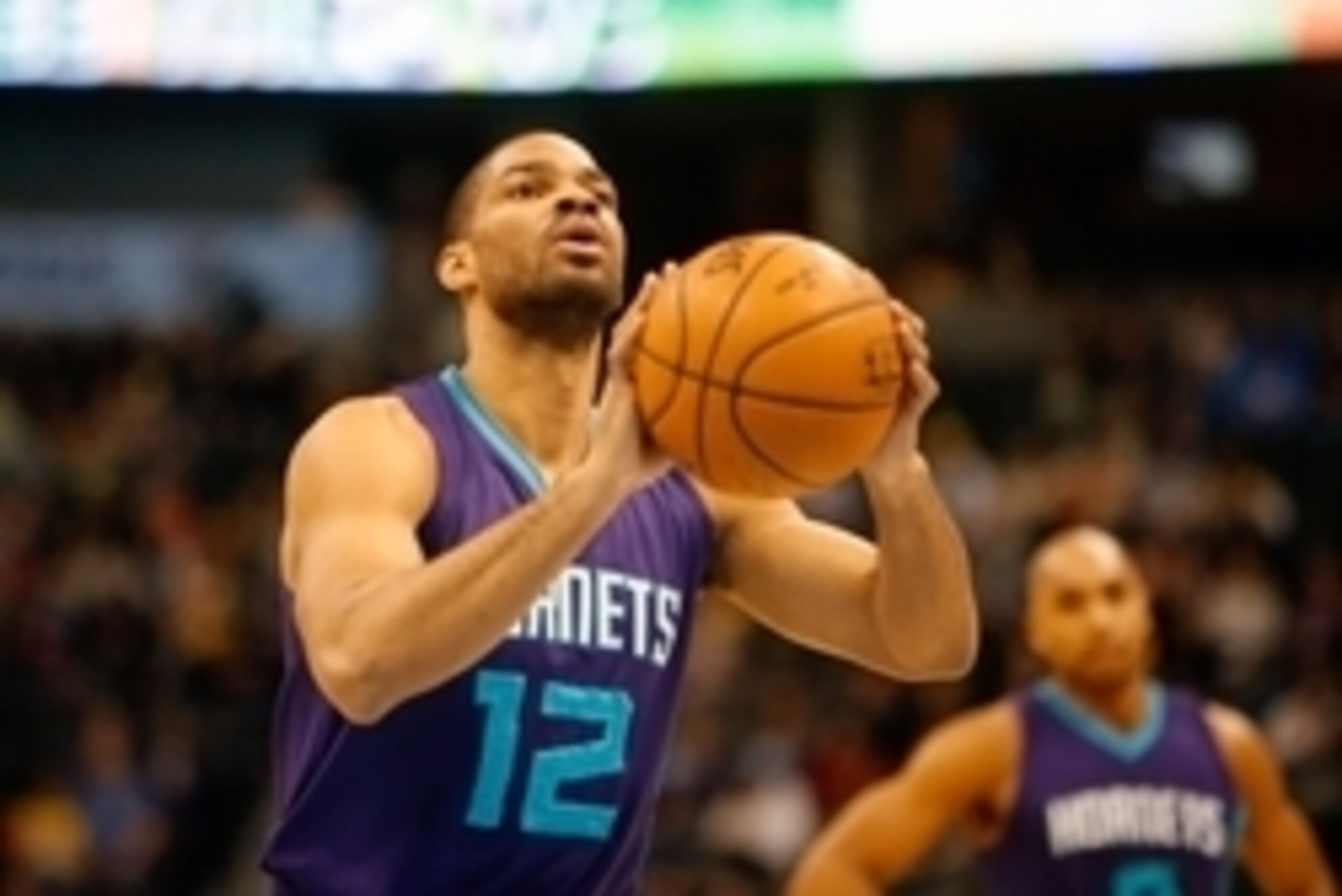Jan 31, 2015; Denver, CO, USA; Charlotte Hornets guard Gary Neal (12) during the game against the Denver Nuggets at Pepsi Center. Mandatory Credit: Chris Humphreys-USA TODAY Sports