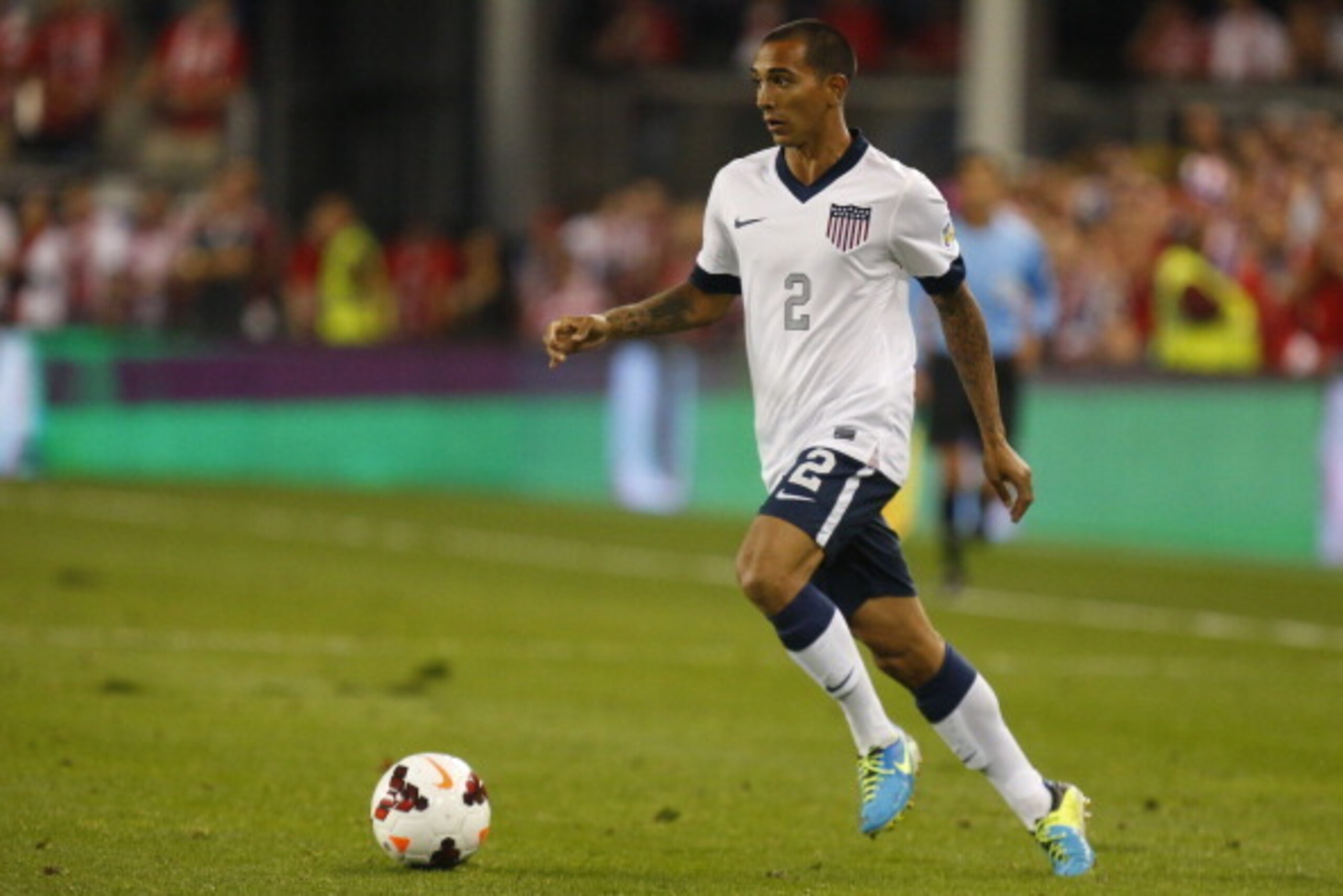 KANSAS CITY, KS - OCTOBER 11: Edgar Castillo #2 of the U.S. Men's National Soccer Team looks for an open lane against Jamaica midway in the second half at Sporting Park on October 11, 2013 in Kansas City, Kansas. (Photo by Kyle Rivas/Getty Images)
