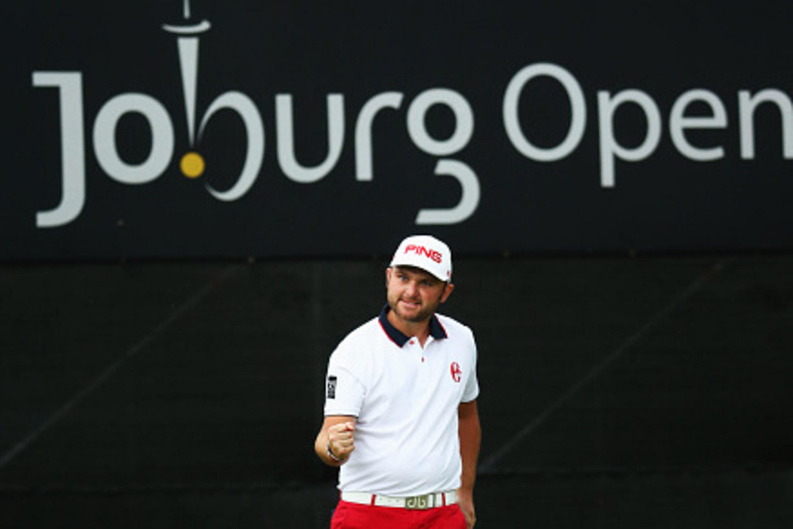 JOHANNESBURG, SOUTH AFRICA - MARCH 01:  Andy Sullivan of England celebrates his final putt on the 18th green during the Joburg Open final round at Royal Johannesburg and Kensington Golf Club on March 1, 2015 in Johannesburg, South Africa.  (Photo by Warre
