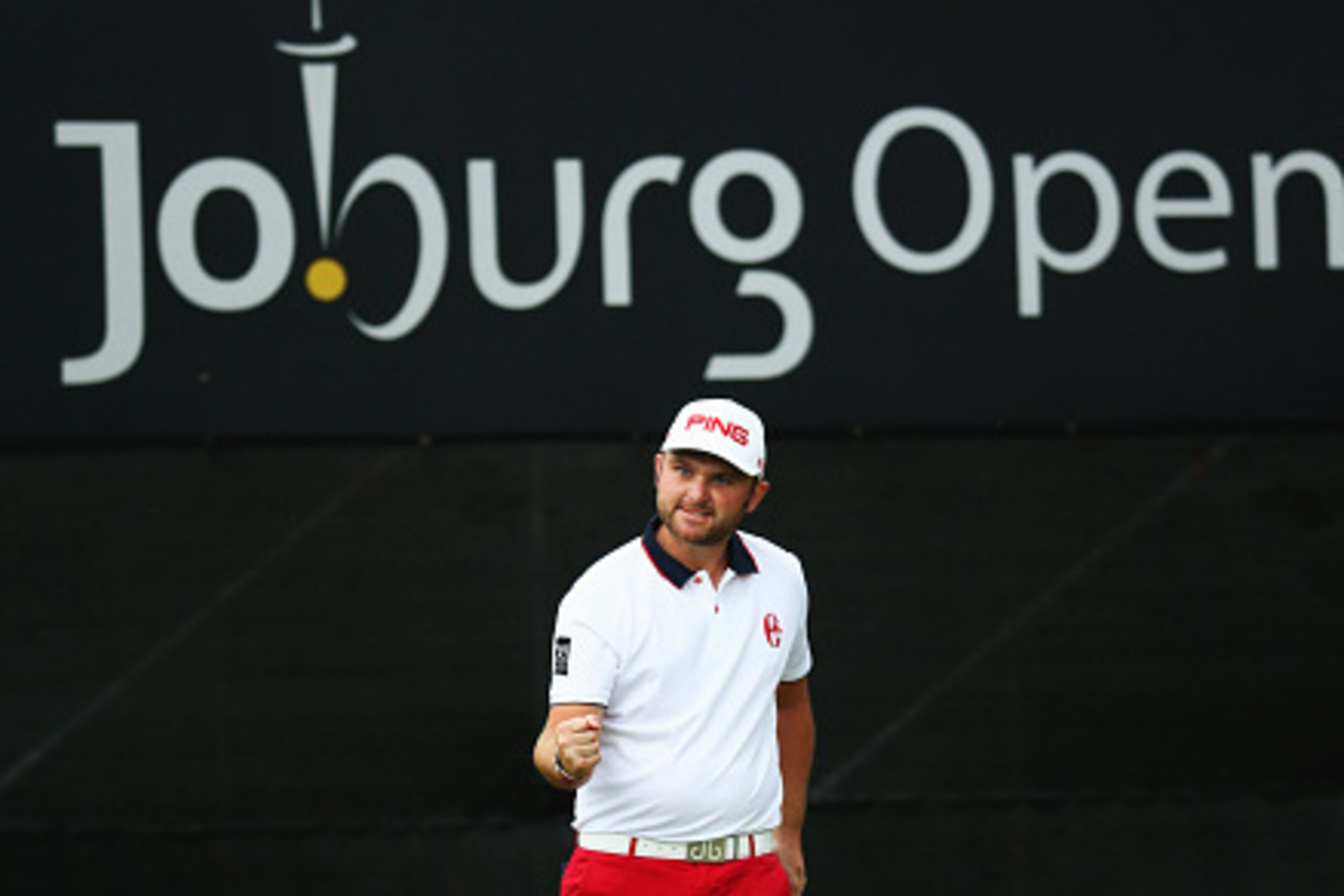 JOHANNESBURG, SOUTH AFRICA - MARCH 01:  Andy Sullivan of England celebrates his final putt on the 18th green during the Joburg Open final round at Royal Johannesburg and Kensington Golf Club on March 1, 2015 in Johannesburg, South Africa.  (Photo by Warre