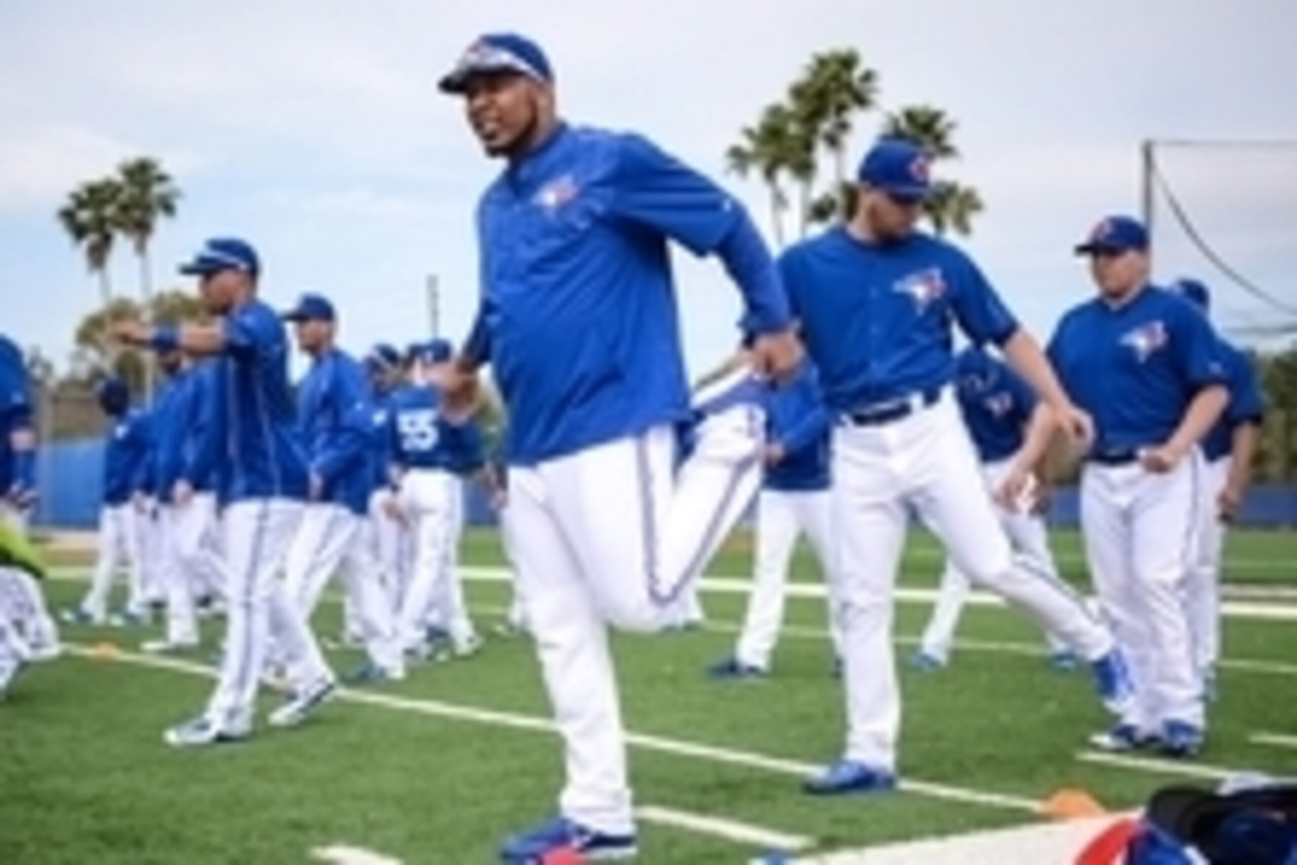 Feb 27, 2015; Dunedin, FL, USA;  Toronto Blue Jays infielder Edwin Encarnacion (10) warm up at the start of Friday mornings workout at the Bobby Mattick Training Center. Mandatory Credit: Jonathan Dyer-USA TODAY Sports