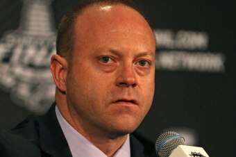 CHICAGO, IL - JUNE 11: General Manager Stan Bowman of the Chicago Blackhawks speaks during the 2013 NHL Stanley Cup media day at the United Center on June 11, 2013 in Chicago, Illinois.  (Photo by Jonathan Daniel/Getty Images)