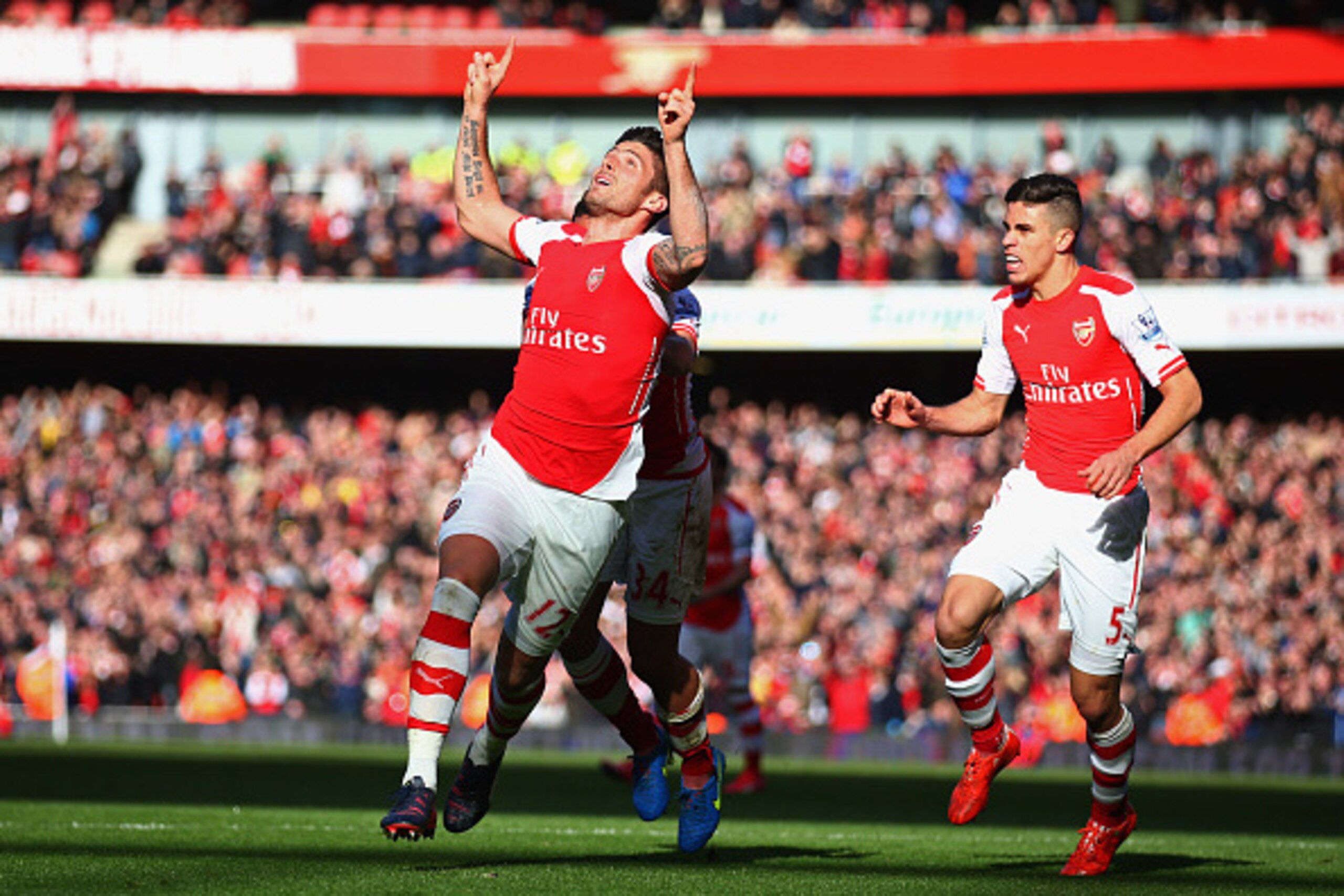 LONDON, ENGLAND - MARCH 01: Olivier Giroud of Arsenal (9) celebrates as he scores their first goal during the Barclays Premier League match between Arsenal and Everton at Emirates Stadium on March 1, 2015 in London, England. (Photo by Paul Gilham/Getty LONDON, ENGLAND - MARCH 01: Olivier Giroud of Arsenal (9) celebrates as he scores their first goal during the Barclays Premier League match between Arsenal and Everton at Emirates Stadium on March 1, 2015 in London, England. (Photo by Paul Gilham/Getty