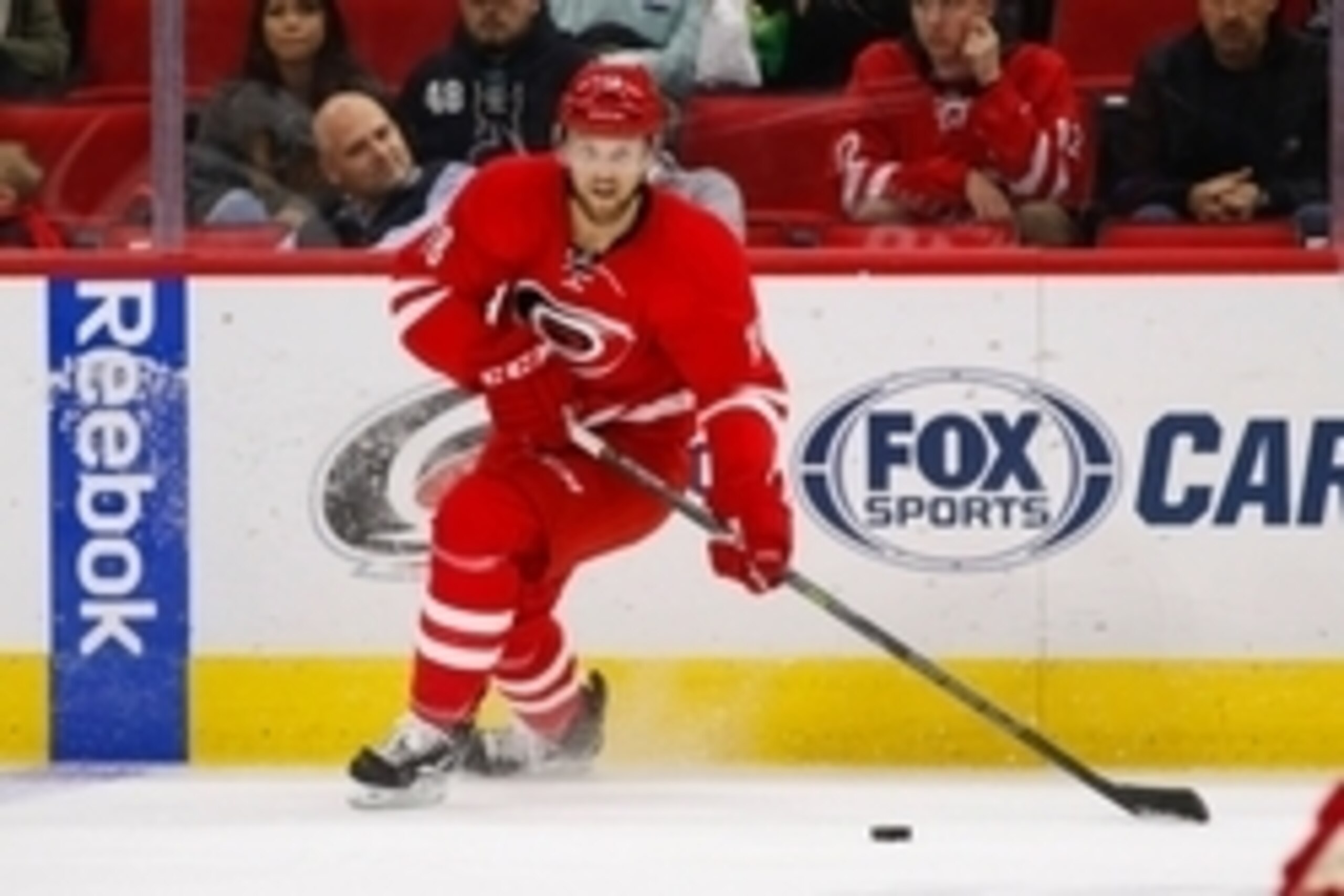 Nov 16, 2014; Raleigh, NC, USA; Carolina Hurricanes forward Jay McClement (18) skates with the puck against the San Jose Sharks at PNC Arena. The San Jose Sharks  defeated the Carolina Hurricanes 2-0. Mandatory Credit: James Guillory-USA TODAY Sports