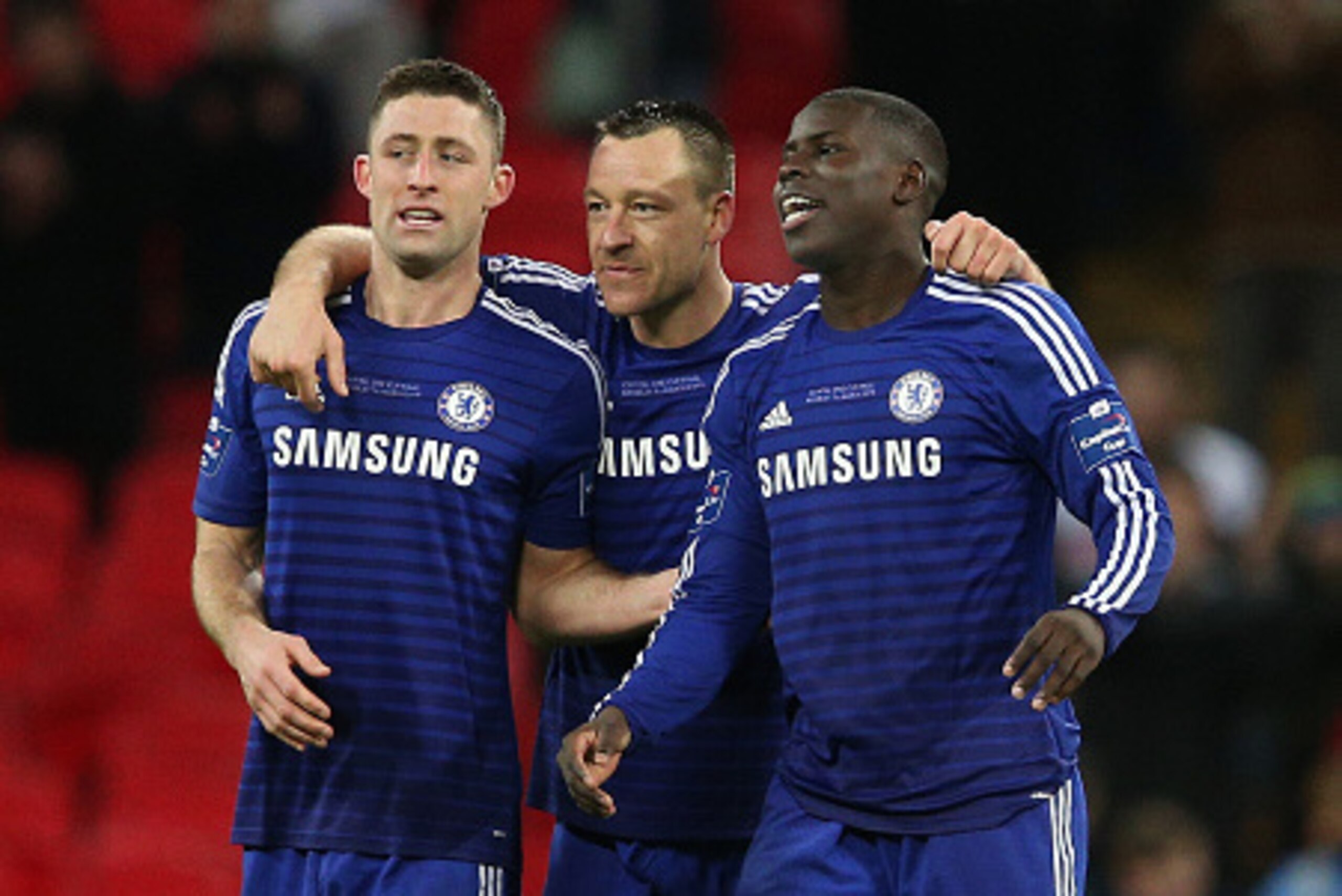 LONDON, ENGLAND - MARCH 01:  (L-R) Gary Cahill, John Terry and Kurt Zouma of Chelsea celebrate after victory in the Capital One Cup Final match between Chelsea and Tottenham Hotspur at Wembley Stadium on March 1, 2015 in London, England.  (Photo by Clive 