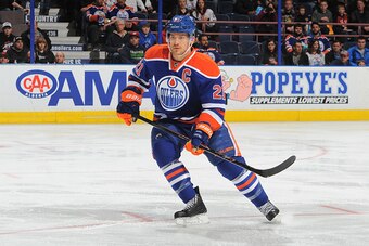 EDMONTON, AB - FEBRUARY 28: Andrew Ference #21 of the Edmonton Oilers skates on the ice during the game against the St. Louis Blues on February 28, 2015 at Rexall Place in Edmonton, Alberta, Canada. (Photo by Andy Devlin/NHLI via Getty Images)